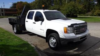 2014 GMC Sierra 3500HD Flat Deck Crew Cab 4WD Dually, 6.0L V8 OHV 16V FFV Gas engine, 8 cylinder, 4 door, automatic, 4WD, 4-Wheel ABS, cruise control, air conditioning, AM/FM radio, power door locks, power windows, power mirrors, white exterior, grey interior, cloth. Certificate and Decal Valid to August 2024 $25,750.00 plus $375 processing fee, $26,125.00 total payment obligation before taxes.  Listing report, warranty, contract commitment cancellation fee, financing available on approved credit (some limitations and exceptions may apply). All above specifications and information is considered to be accurate but is not guaranteed and no opinion or advice is given as to whether this item should be purchased. We do not allow test drives due to theft, fraud and acts of vandalism. Instead we provide the following benefits: Complimentary Warranty (with options to extend), Limited Money Back Satisfaction Guarantee on Fully Completed Contracts, Contract Commitment Cancellation, and an Open-Ended Sell-Back Option. Ask seller for details or call 604-522-REPO(7376) to confirm listing availability.