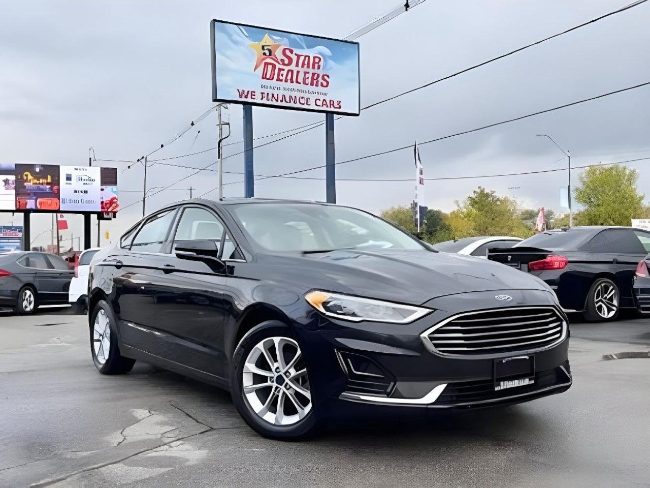 Used 2020 Ford Fusion Hybrid SEL HYBRID NAV LEATHER LOW KM WE FINANCE ALL CREDI for sale in London, ON