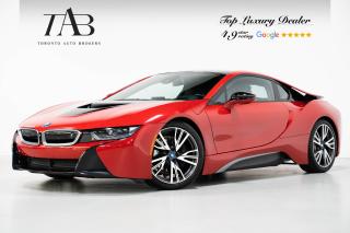 This beautiful 2017 BMW i8 Coupe is a local Ontario vehicle with a clean Carfax report. Its striking design, complete with scissor doors, turns heads wherever it goes, while the HUD keeps you connected to vital information without taking your eyes off the road. This electrifying fusion of style and technology makes every drive a thrilling and eco-friendly adventure.

Key features Include:

- Plug-in hybrid powertrain
- PROTONIC RED EDITION
- Turbocharged 1.5-liter three-cylinder engine
- Scissor doors
- 6-speed automatic transmission
- Regenerative braking system
- Electric-only driving mode
- Lightweight carbon fiber construction
- Premium leather upholstery
- Heated front seats
- Dual-zone automatic climate control
- iDrive infotainment system
- Harman Kardon audio system
- Navigation system
- Bluetooth connectivity
- Head-Up Display
- Adaptive LED headlights
- Park Distance Control 
- Keyless entry and ignition
- Electric power steering for precision control

NOW OFFERING 3 MONTH DEFERRED FINANCING PAYMENTS ON APPROVED CREDIT. 

Looking for a top-rated pre-owned luxury car dealership in the GTA? Look no further than Toronto Auto Brokers (TAB)! Were proud to have won multiple awards, including the 2023 GTA Top Choice Luxury Pre Owned Dealership Award, 2023 CarGurus Top Rated Dealer, 2024 CBRB Dealer Award, the Canadian Choice Award 2024, the 2023 Three Best Rated Dealer Award, and many more!

With 30 years of experience serving the Greater Toronto Area, TAB is a respected and trusted name in the pre-owned luxury car industry. Our 30,000 sq.Ft indoor showroom is home to a wide range of luxury vehicles from top brands like BMW, Mercedes-Benz, Audi, Porsche, Land Rover, Jaguar, Aston Martin, Bentley, Maserati, and more. And we dont just serve the GTA, were proud to offer our services to all cities in Canada, including Vancouver, Montreal, Calgary, Edmonton, Winnipeg, Saskatchewan, Halifax, and more.

At TAB, were committed to providing a no-pressure environment and honest work ethics. As a family-owned and operated business, we treat every customer like family and ensure that every interaction is a positive one. Come experience the TAB Lifestyle at its truest form, luxury car buying has never been more enjoyable and exciting!

We offer a variety of services to make your purchase experience as easy and stress-free as possible. From competitive and simple financing and leasing options to extended warranties, aftermarket services, and full history reports on every vehicle, we have everything you need to make an informed decision. We welcome every trade, even if youre just looking to sell your car without buying, and when it comes to financing or leasing, we offer same day approvals, with access to over 50 lenders, including all of the banks in Canada. Feel free to check out your own Equifax credit score without affecting your credit score, simply click on the Equifax tab above and see if you qualify.

So if youre looking for a luxury pre-owned car dealership in Toronto, look no further than TAB! We proudly serve the GTA, including Toronto, Etobicoke, Woodbridge, North York, York Region, Vaughan, Thornhill, Richmond Hill, Mississauga, Scarborough, Markham, Oshawa, Peteborough, Hamilton, Newmarket, Orangeville, Aurora, Brantford, Barrie, Kitchener, Niagara Falls, Oakville, Cambridge, Kitchener, Waterloo, Guelph, London, Windsor, Orillia, Pickering, Ajax, Whitby, Durham, Cobourg, Belleville, Kingston, Ottawa, Montreal, Vancouver, Winnipeg, Calgary, Edmonton, Regina, Halifax, and more.

Call us today or visit our website to learn more about our inventory and services. And remember, all prices exclude applicable taxes and licensing, and vehicles can be certified at an additional cost of $699.