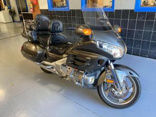 <p>2009 Honda Goldwing GL1800</p><p>Has electric Reverse, Navigation, ABS, etc.</p><p>Has a few scratches & scrapes, drivers seat has a tear in it.</p><p>In very good shape overall, cleans up well.</p><p> </p><p>Asking $11,000 as-is, including all taxes & fees to transfer the bike into your name.</p><p> </p><p>OMVIC as-is disclosure:<span id=dnn_ctr1169_dnnTITLE_titleLabel class=TitleH2></span></p><p style=font-style: italic;>“This vehicle is being sold “as is,” unfit, not e-tested and is not represented as being in road worthy condition, mechanically sound or maintained at any guaranteed level of quality. The vehicle may not be fit for use as a means of transportation and may require substantial repairs at the purchaser’s expense. It may not be possible to register the vehicle to be driven in its current condition.”</p>