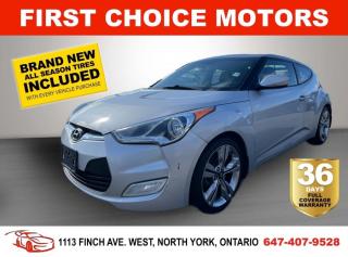 Welcome to First Choice Motors, the largest car dealership in Toronto of pre-owned cars, SUVs, and vans priced between $5000-$15,000. With an impressive inventory of over 300 vehicles in stock, we are dedicated to providing our customers with a vast selection of affordable and reliable options. <br><br>Were thrilled to offer a used 2013 Hyundai Veloster TECH, silver color with 249,000km (STK#6693) This vehicle was $7490 NOW ON SALE FOR $5990. It is equipped with the following features:<br>- Automatic Transmission<br>- Sunroof<br>- Heated seats<br>- Navigation<br>- Bluetooth<br>- Reverse camera<br>- Parking distance control<br>- Alloy wheels<br>- Power windows<br>- Power locks<br>- Power mirrors<br>- Air Conditioning<br><br>At First Choice Motors, we believe in providing quality vehicles that our customers can depend on. All our vehicles come with a 36-day FULL COVERAGE warranty. We also offer additional warranty options up to 5 years for our customers who want extra peace of mind.<br><br>Furthermore, all our vehicles are sold fully certified with brand new brakes rotors and pads, a fresh oil change, and brand new set of all-season tires installed & balanced. You can be confident that this car is in excellent condition and ready to hit the road.<br><br>At First Choice Motors, we believe that everyone deserves a chance to own a reliable and affordable vehicle. Thats why we offer financing options with low interest rates starting at 7.9% O.A.C. Were proud to approve all customers, including those with bad credit, no credit, students, and even 9 socials. Our finance team is dedicated to finding the best financing option for you and making the car buying process as smooth and stress-free as possible.<br><br>Our dealership is open 7 days a week to provide you with the best customer service possible. We carry the largest selection of used vehicles for sale under $9990 in all of Ontario. We stock over 300 cars, mostly Hyundai, Chevrolet, Mazda, Honda, Volkswagen, Toyota, Ford, Dodge, Kia, Mitsubishi, Acura, Lexus, and more. With our ongoing sale, you can find your dream car at a price you can afford. Come visit us today and experience why we are the best choice for your next used car purchase!<br><br>All prices exclude a $10 OMVIC fee, license plates & registration  and ONTARIO HST (13%)