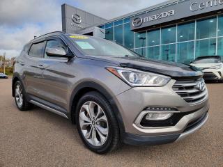 <span>This is a properly luxurious and truly rapid SUV. The all-wheel-drive 2018 Hyundai Santa Fe Limited 2.0T provides peak performance and peak luxury in a remarkably affordable and spacious package. </span>




<span>Cranking out 240 horsepower and 260 lb-ft of torque, the Santa Fes turbocharged powerplant provides 30% more power than the ordinary Santa Fe engine. The performance is enticing, but its the premium cabin thatll have you falling in love. The Santa Fe Limited provides navigation, HID headlights, and LED taillights, on top of an enormously lengthy list of standard equipment. </span>




<span>Theres a panoramic sunroof and leather seating, a 12-way power drivers seat, heated front and rear seats plus a heated steering wheel, integrated rear sunshades, a hands-free power liftgate, sliding second-row seats, and plenty of advanced safety tech such as blind spot monotoring, rear park assist sensors, and rear cross traffic alert.</span>




Thank you for your interest in this vehicle. Its located at Centennial Mazda, 402 Mt. Edward Road, Charlottetown, PEI. We look forward to hearing from you – call us toll-free at 1-902-894-8593.