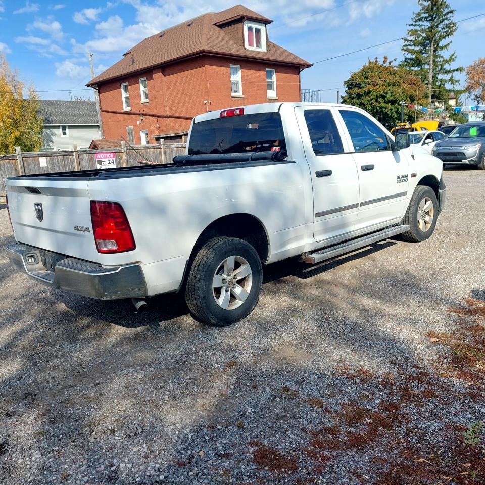 2017 RAM 1500 4WD Quad Cab 140.5" - Photo #4