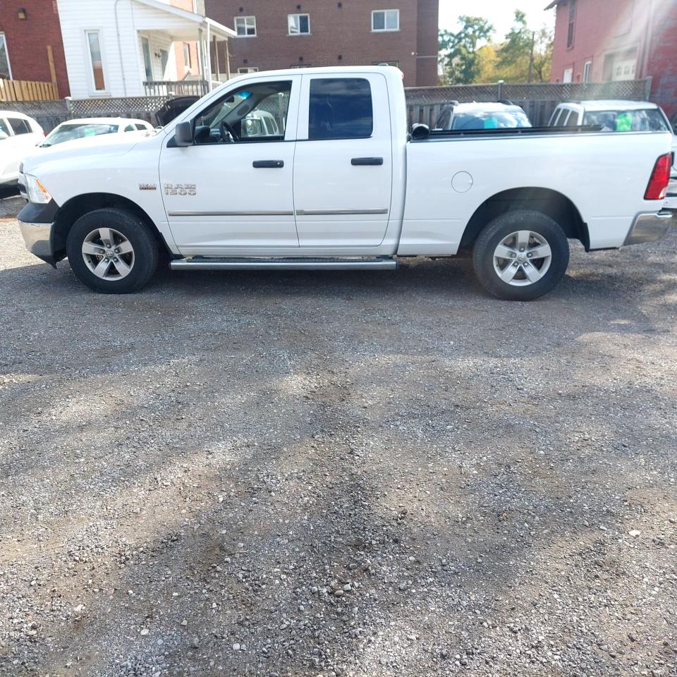 2017 RAM 1500 4WD Quad Cab 140.5" - Photo #1