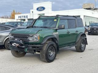 <p> a vehicle that combines rugged capability with uncompromised comfort. With a striking green exterior and a sleek black interior</p>
<p> this Bronco Everglades stands out with its adventurous spirit and stylish presence. Equipped with a powerful 2.3L EcoBoost I-4 engine and a smooth 10-speed automatic transmission designed for the trail</p>
<p> this off-road warrior is ready to take you wherever the road ends. 

ADVANCED SAFETY FEATURES:
--> Advanced traction control for off-road confidence
--> Robust airbag system for passenger protection
--> Rearview camera for easy reversing
--> Tire pressure monitoring for optimal safety

PERFORMANCE AND EFFICIENCY:
--> 2.3L EcoBoost I-4 engine for robust performance
--> 10-speed automatic transmission for seamless shifting
--> Trail-tuned suspension for superior off-road handling
--> Efficient powertrain for balanced fuel economy

COMFORT AND CONVENIENCE:
--> Spacious interior for comfortable long journeys
--> Automatic climate control for ideal cabin temperature
--> Power-adjustable seating for personalized comfort
--> Easy-to-clean surfaces</p>
<p> perfect for off-road trips

TECHNOLOGY AND CONNECTIVITY:
--> Intuitive infotainment system for entertainment
--> Bluetooth connectivity for hands-free communication
--> USB ports for device charging and connectivity
--> Advanced driver displays for vital vehicle information

CARGO SPACE:
--> Generous cargo capacity for gear and supplies
--> Flexible rear seating for additional space
--> Convenient tie-down points for secure storage
--> Easy-access tailgate for hassle-free loading

WHAT OTHER OWNERS LIKE:
--> The Bronco Evergladesrugged yet refined design
--> The confidence-inspiring safety features
--> The balance between performance and efficiency
--> The high level of technology and connectivity

Experience the perfect blend of off-road prowess and everyday usability with this exceptional Ford Bronco Everglades</p>
<a href=http://www.petrieford.com/used/Ford-Bronco-2022-id10057075.html>http://www.petrieford.com/used/Ford-Bronco-2022-id10057075.html</a>