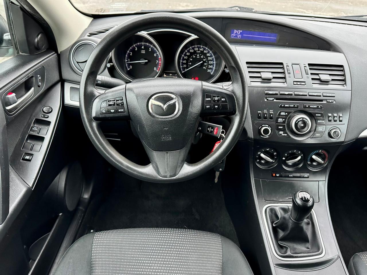 2012 Mazda MAZDA3 GX - Safety Certified Photo2