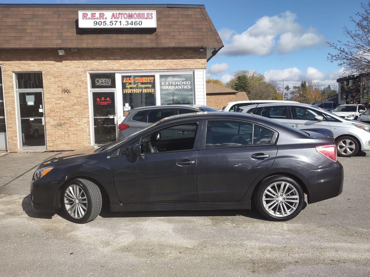 2012 Subaru Impreza 4dr Sdn CVT 2.0i w/Touring Pkg