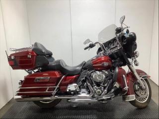 2010 Harley-Davidson Flhtcu Ultra Classic Electra Glide Motorcycle, 1584cc, 96 cubic inch V-Twin, 2 cylinder, manual, belt drive, cruise control, AM/FM radio, CD player, high rise bars, lower fairings, highway pegs, saddle bags, tour pack with luggage rack, passenger floor boards, Vance & Hines exhaust, red exterior. $8,970.00 plus $375 processing fee, $9,345.00 total payment obligation before taxes.  Listing report, warranty, contract commitment cancellation fee, financing available on approved credit (some limitations and exceptions may apply). All above specifications and information is considered to be accurate but is not guaranteed and no opinion or advice is given as to whether this item should be purchased. We do not allow test drives due to theft, fraud and acts of vandalism. Instead we provide the following benefits: Complimentary Warranty (with options to extend), Limited Money Back Satisfaction Guarantee on Fully Completed Contracts, Contract Commitment Cancellation, and an Open-Ended Sell-Back Option. Ask seller for details or call 604-522-REPO(7376) to confirm listing availability.