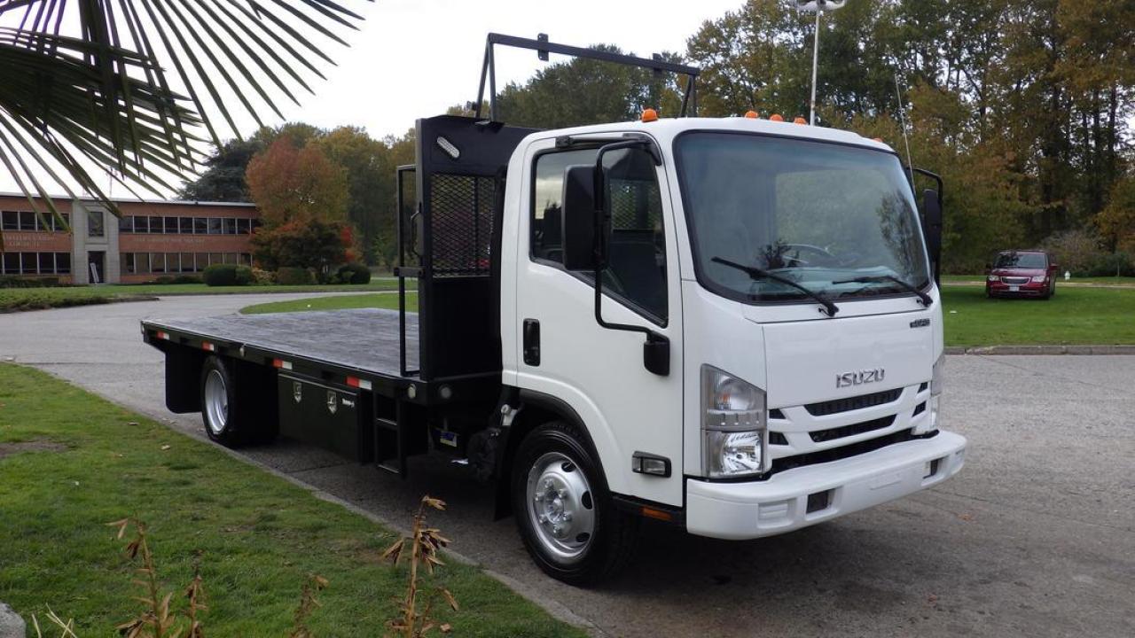 2016 Isuzu NPR Flat Deck, 2 door, V6 Gas Engine, automatic, cruise control, air conditioning, AM/FM radio, CD player, bluetooth,  power door locks, power windows, white exterior, blue interior, cloth. Certificate and Decal Valid to October 2024. Measurements: 16 foot long, 8 foot width. (all the measurements are deemed to correct but are not guaranteed). $59,810.00 plus $375 processing fee, $60,185.00 total payment obligation before taxes.  Listing report, warranty, contract commitment cancellation fee, financing available on approved credit (some limitations and exceptions may apply). All above specifications and information is considered to be accurate but is not guaranteed and no opinion or advice is given as to whether this item should be purchased. We do not allow test drives due to theft, fraud and acts of vandalism. Instead we provide the following benefits: Complimentary Warranty (with options to extend), Limited Money Back Satisfaction Guarantee on Fully Completed Contracts, Contract Commitment Cancellation, and an Open-Ended Sell-Back Option. Ask seller for details or call 604-522-REPO(7376) to confirm listing availability.