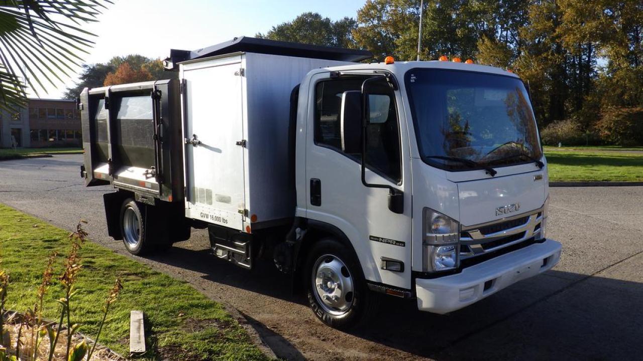 2016 Isuzu NPR Dump Truck 3 Seater Diesel, 5.2L L4 DIESEL engine, 4 cylinder, 2 door, automatic, 4X2, cruise control, air conditioning, AM/FM radio, power door locks, power windows, white exterior, black interior, cloth. Certification and Decal valid until February 2024. $69,810.00 plus $375 processing fee, $70,185.00 total payment obligation before taxes.  Listing report, warranty, contract commitment cancellation fee, financing available on approved credit (some limitations and exceptions may apply). All above specifications and information is considered to be accurate but is not guaranteed and no opinion or advice is given as to whether this item should be purchased. We do not allow test drives due to theft, fraud and acts of vandalism. Instead we provide the following benefits: Complimentary Warranty (with options to extend), Limited Money Back Satisfaction Guarantee on Fully Completed Contracts, Contract Commitment Cancellation, and an Open-Ended Sell-Back Option. Ask seller for details or call 604-522-REPO(7376) to confirm listing availability.