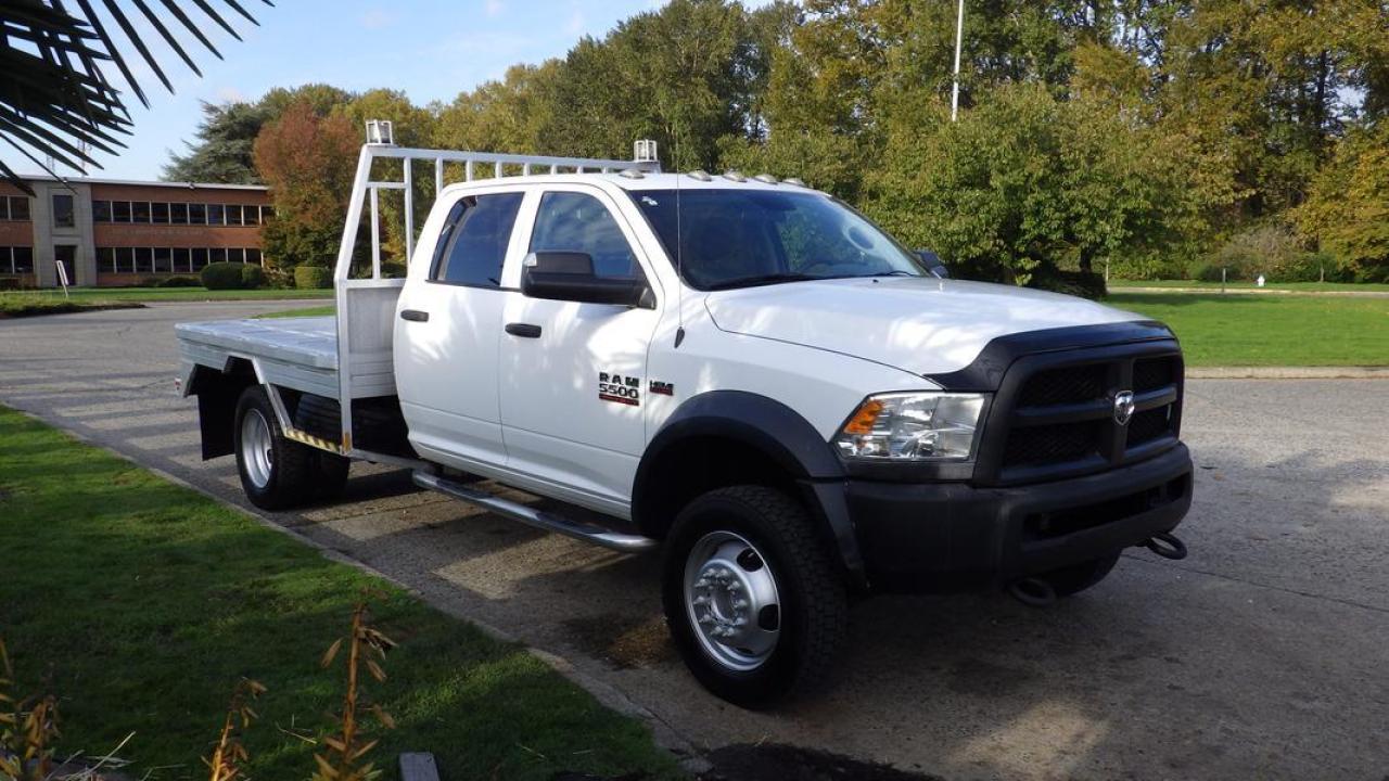 2014 RAM 5500 Crew Cab 9 Foot Flat Deck 4WD, 6.4L V8 OHV 16V Gas engine, 8 cylinder, 4 door, automatic, 4WD, cruise control, AM/FM radio, power door locks, power windows, power mirrors, white exterior, grey interior, cloth. Certificate and Decal Valid to October 2024 $45,830.00 plus $375 processing fee, $46,205.00 total payment obligation before taxes.  Listing report, warranty, contract commitment cancellation fee, financing available on approved credit (some limitations and exceptions may apply). All above specifications and information is considered to be accurate but is not guaranteed and no opinion or advice is given as to whether this item should be purchased. We do not allow test drives due to theft, fraud and acts of vandalism. Instead we provide the following benefits: Complimentary Warranty (with options to extend), Limited Money Back Satisfaction Guarantee on Fully Completed Contracts, Contract Commitment Cancellation, and an Open-Ended Sell-Back Option. Ask seller for details or call 604-522-REPO(7376) to confirm listing availability.
