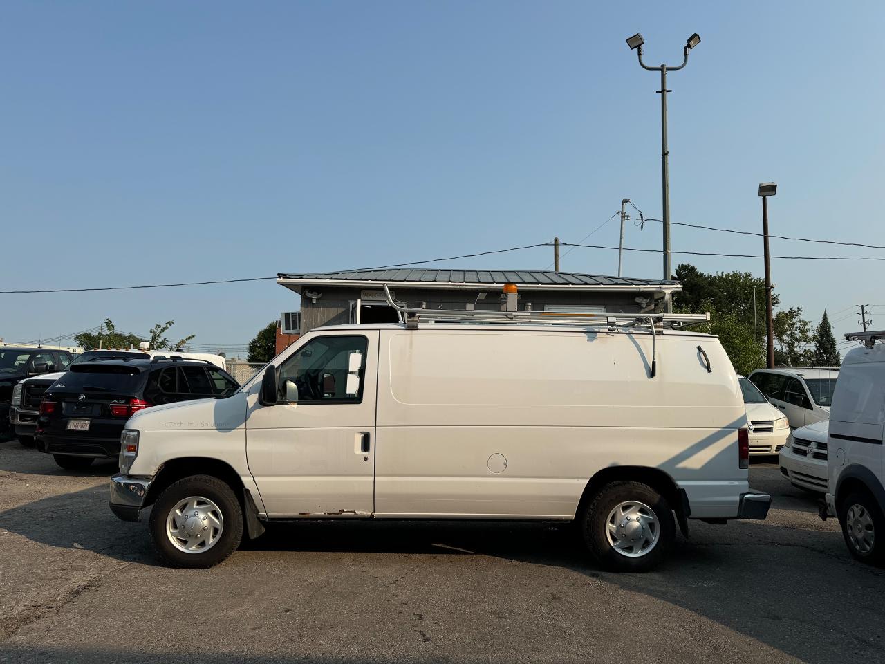 2012 Ford Econoline E-150 Commercial Photo4