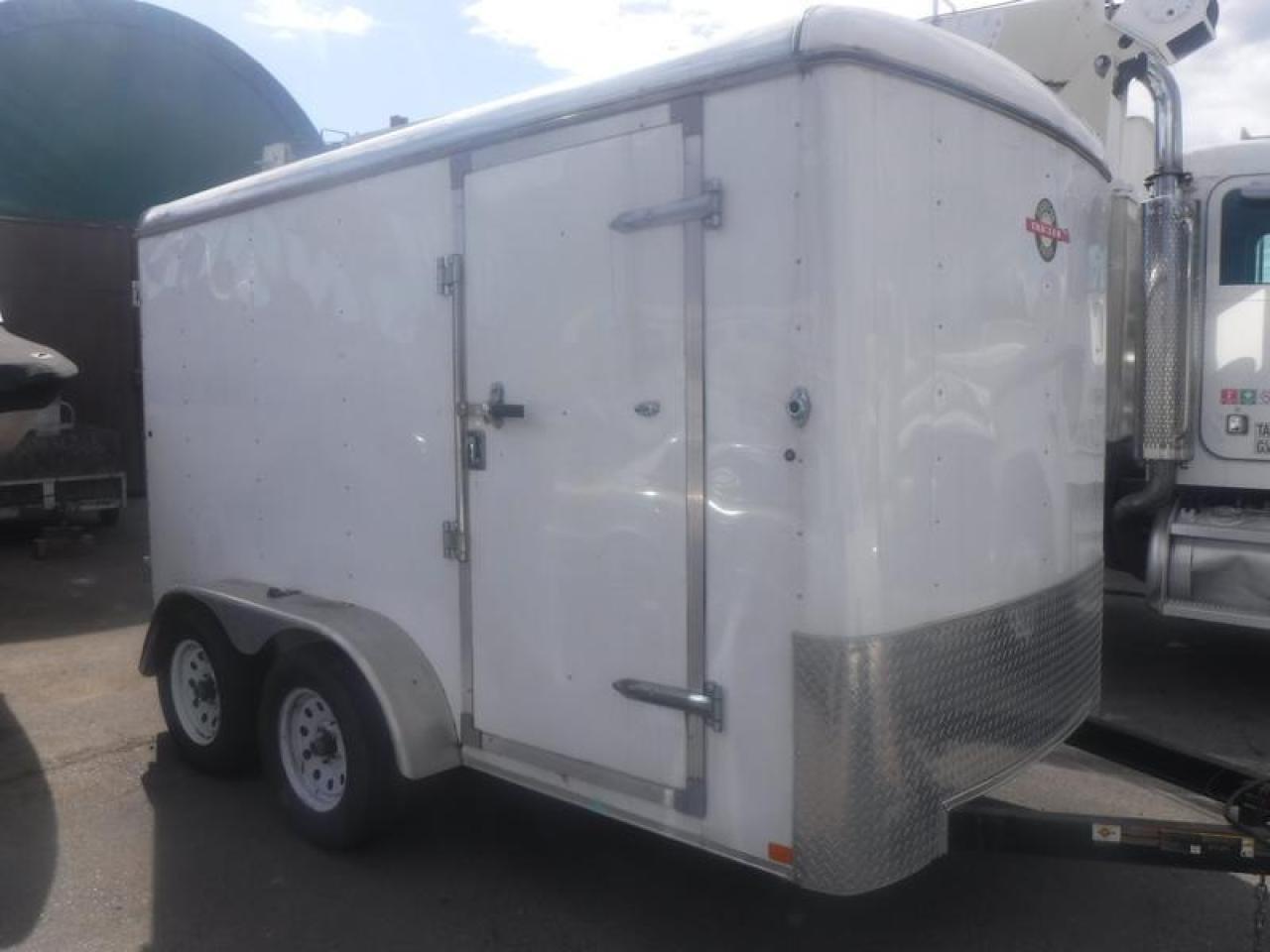 2019 Carry-On Cargo Tandem Trailer, white exterior.  Exterior Size: 12 Feet Long by 6 Feet Wide by 6 Feet 8 Inches High $8,750.00 plus $375 processing fee, $9,125.00 total payment obligation before taxes.  Listing report, warranty, contract commitment cancellation fee, financing available on approved credit (some limitations and exceptions may apply). All above specifications and information is considered to be accurate but is not guaranteed and no opinion or advice is given as to whether this item should be purchased. We do not allow test drives due to theft, fraud and acts of vandalism. Instead we provide the following benefits: Complimentary Warranty (with options to extend), Limited Money Back Satisfaction Guarantee on Fully Completed Contracts, Contract Commitment Cancellation, and an Open-Ended Sell-Back Option. Ask seller for details or call 604-522-REPO(7376) to confirm listing availability.