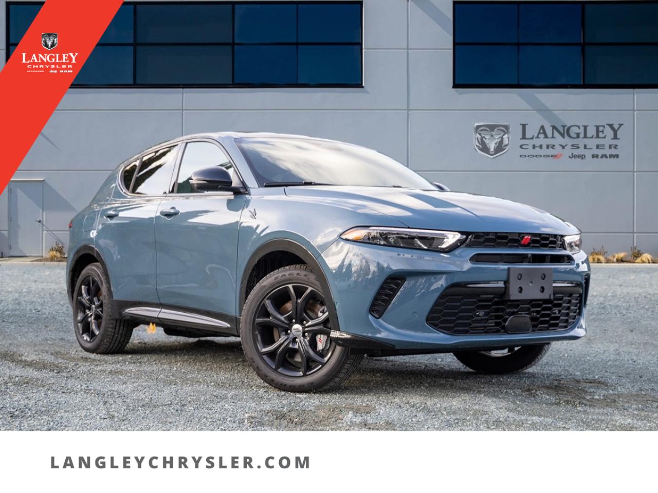 <p><strong><span style=font-family:Arial; font-size:16px;>Plunge yourself in the ultimate driving experience with this unparalleled 2024 Dodge Hornet PHEV R/T..</span></strong></p> <p><strong><span style=font-family:Arial; font-size:16px;>An embodiment of innovation and performance, this luxurious SUV is a perfect blend of style, comfort, and technology..</span></strong> <br> Wrapped in a mesmerising blue hue that complements the sleek, aerodynamic design, this vehicle commands attention on every road it traverses.. Step inside and immerse yourself in a sanctuary of luxury.</p> <p><strong><span style=font-family:Arial; font-size:16px;>The black interior exudes sophistication, offering a harmonious balance of style and comfort..</span></strong> <br> From the heated door mirrors to the leather steering wheel and shift knob, every element is meticulously designed to enhance your driving experience.. This brand-new vehicle, right off the assembly line, is packed with cutting-edge features that set it apart from the competition.</p> <p><strong><span style=font-family:Arial; font-size:16px;>The adaptive cruise control provides a stress-free driving experience while the automatic headlights ensure optimal visibility at all times..</span></strong> <br> This SUV also boasts a garage door transmitter, a security system and a 1.3L 4cyl engine mated to a 6-speed automatic transmission, ensuring a smooth and powerful drive.. Safety has been given paramount importance with the Dodge Hornet PHEV R/T, equipped with anti-whiplash front head restraints, occupant sensing airbag, brake assist and an ignition disable feature.</p> <p><strong><span style=font-family:Arial; font-size:16px;>The electronic stability and traction control offer superior control, making every journey a safe one..</span></strong> <br> At Langley Chrysler, we believe in not just loving your car, but also loving the process of buying it.. We strive to make your buying experience as pleasant as possible, offering unparalleled service and support.</p> <p><strong><span style=font-family:Arial; font-size:16px;>This 2024 Dodge Hornet PHEV R/T is a testament to superior craftsmanship, a beacon of modern design, a symphony of innovation..</span></strong> <br> Its not just a vehicle, its an experience, a statement, a lifestyle.. Its the epitome of luxury and performance, waiting for its first drive.</p> <p><strong><span style=font-family:Arial; font-size:16px;>With every dawn, a journey awaits,
In your brand-new Dodge, open the gates..</span></strong> <br> In luxury wrapped, in safety encased,
With the Hornet PHEV, make haste.. So why wait? The open road is calling.</p> <p><strong><span style=font-family:Arial; font-size:16px;>Answer it with the 2024 Dodge Hornet PHEV R/T..</span></strong> <br> Your brand-new adventure awaits at Langley Chrysler</p>Dealer number: 5097, Doc fee: $968 Safety & Convince Warranty: $699 Finance Placement: $628

<p>*All prices are net of all manufacturer incentives and/or rebates and are subject to change by the manufacturer without notice. All prices plus applicable taxes, applicable environmental recovery charges, documentation of $599 and full tank of fuel surcharge of $76 if a full tank is chosen.<br />Other items available that are not included in the above price:<br />Tire & Rim Protection and Key fob insurance starting from $599<br />Service contracts (extended warranties) for up to 7 years and 200,000 kms starting from $599<br />Custom vehicle accessory packages, mudflaps and deflectors, tire and rim packages, lift kits, exhaust kits and tonneau covers, canopies and much more that can be added to your payment at time of purchase<br />Undercoating, rust modules, and full protection packages starting from $199<br />Flexible life, disability and critical illness insurances to protect portions of or the entire length of vehicle loan?im?im<br />Financing Fee of $500 when applicable<br />Prices shown are determined using the largest available rebates and incentives and may not qualify for special APR finance offers. See dealer for details. This is a limited time offer.</p>