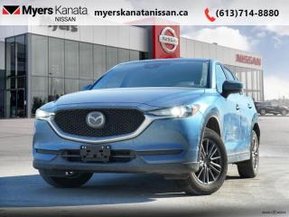 <b>Low Mileage, Synthetic Leather Seats,  Power Liftgate,  Heated Seats,  Heated Steering Wheel,  Apple CarPlay!</b><br> <br>  Compare at $31795 - KANATA NISSAN PRICE is just $29995! <br> <br>   In a competitive compact crossover segment, this 2021 Mazda CX-5 shines with its agile handling, beautiful and comfortable interior and impressive styling. This  2021 Mazda CX-5 is for sale today in Kanata. This low mileage  SUV has just 30,321 kms. Its  blue in colour  . It has an automatic transmission and is powered by a  187HP 2.5L 4 Cylinder Engine. <br> <br> Our CX-5s trim level is GS. Stepping up to this ultra modern CX-5 GS is a great choice as you will get improved features like a power liftgate, heated steering wheels, stylish aluminum wheels, advanced blind spot monitoring, heated seats on synthetic leather upholstery and a large touch screen display with MAZDA CONNECT, Apple CarPlay and Android Auto. Additional luxurious features include LED lighting, a multifunction steering wheel with built-in distance pacing cruise control, lane departure warning and lane keep assist, automatic high beam assist, a wide angle rearview camera, rear collision warning and a proximity key for push button start. This vehicle has been upgraded with the following features: Synthetic Leather Seats,  Power Liftgate,  Heated Seats,  Heated Steering Wheel,  Apple Carplay,  Android Auto,  Aluminum Wheels. <br> <br/><br> Payments from <b>$482.44</b> monthly with $0 down for 84 months @ 8.99% APR O.A.C. ( Plus applicable taxes -  and licensing    ).  See dealer for details. <br> <br>*LIFETIME ENGINE TRANSMISSION WARRANTY NOT AVAILABLE ON VEHICLES WITH KMS EXCEEDING 140,000KM, VEHICLES 8 YEARS & OLDER, OR HIGHLINE BRAND VEHICLE(eg. BMW, INFINITI. CADILLAC, LEXUS...)<br> Come by and check out our fleet of 30+ used cars and trucks and 80+ new cars and trucks for sale in Kanata.  o~o
