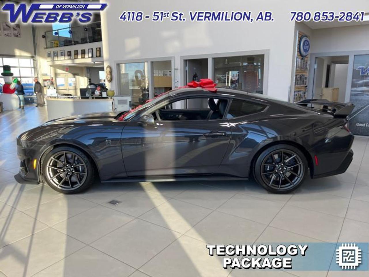 <p><strong>Premium Audio, Tech Package, 19 inch Aluminum Wheels, Wireless Charger!</strong><br><br><br><br>Fords storied Mustang makes a return for 2024 with revised styling and engineering to keep it on top of the muscle car pack. <br><br>From the roar of the engine to its unmistakable style, this all-new Ford Mustang is guaranteed to raise your heart rate and stir your soul. A performance car through and through, this Mustang offers responsive driving dynamics, a comfortable ride and endless smiles by the mile. Its easy to see why the Ford Mustang is still a true American icon.<br><br>This dark matter gray metallic coupe has a 10 speed automatic transmission and is powered by a 500HP 5.0L 8 Cylinder Engine.<br><br>Our Mustangs trim level is Dark Horse. This new Dark Horse trim is engineered for ultimate track performance, with MagneRide dampers, sport-tuned suspension, exclusive performance tires, a wing spoiler for downforce. Off the track, you are treated to niceties such as a premium 12-speaker Bang & Olufsen audio system, adaptive cruise control, a leather/suede-wrapped heated steering wheel, voice-activated dual-zone climate control, heated seats, and an immersive 13.2-inch infotainment screen powered by SYNC 4 QNX, with integrated navigation, smartphone integration, and FordPass Connect mobile hotspot internet access. Safety features also include blind spot detection, evasive steering assist, lane keeping assist with lane departure warning, and automatic emergency braking. This vehicle has been upgraded with the following features: Premium Audio, Tech Package, 19 Inch Aluminum Wheels, Wireless Charger. <br><br>View the original window sticker for this vehicle with this url <strong><a href=http://www.windowsticker.forddirect.com/windowsticker.pdf?vin=1FA6P8R03R5501204 target=_blank rel=noopener>http://www.windowsticker.forddirect.com/windowsticker.pdf?vin=1FA6P8R03R5501204</a></strong>.<br><br>To apply right now for financing use this link : <a href=https://www.webbsford.com/financing/ target=_blank rel=noopener>https://www.webbsford.com/financing/</a><br><br><br><br>Buy this vehicle now for the lowest bi-weekly payment of <strong>$674.93</strong> with $0 down for 84 months @ 7.99% APR O.A.C. ( taxes included, $199 documentation fee / Total cost of borrowing $28859 ). See dealer for details. <br><br>Webbs Ford is located at 4118 - 51st Street in beautiful Vermilion, AB. <br>We offer superior sales and service for our valued customers and are committed to serving our friends and clients with the best services possible. If you are looking to set up a test drive in one of our new Fords or looking to inquire about financing options, please call (780) 853-2841 and speak to one of our professional staff members today. Vehicle pricing offer shown expires 2025-12-31. o~o</p>