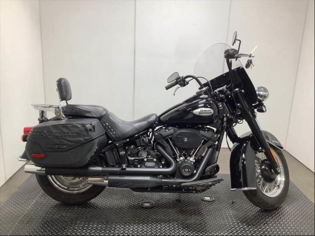 2022 Harley-Davidson Flhcs Heritage Classic Motorcycle, 1870cc, 114 cubic inch V-Twin, 2 cylinder, manual, belt drive, ABS brakes, saddle bags, removable windshield, passenger back rest, luggage rack, black exterior. $15,310.00 plus $375 processing fee, $15,685.00 total payment obligation before taxes. Sale price until January 13, 2024, 6:00 PM PST. Listing report, warranty, contract commitment cancellation fee. All above specifications and information is considered to be accurate but is not guaranteed and no opinion or advice is given as to whether this item should be purchased. We do not allow test drives due to theft, fraud and acts of vandalism. Instead we provide the following benefits: Complimentary Warranty (with options to extend), Limited Money Back Satisfaction Guarantee on Fully Completed Contracts, Contract Commitment Cancellation, and an Open-Ended Sell-Back Option. Ask seller for details or call 604-522-REPO(7376) to confirm listing availability.