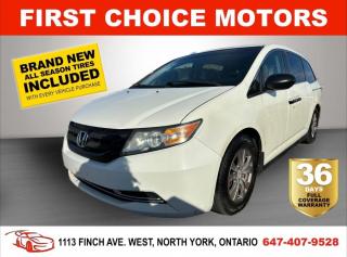 Welcome to First Choice Motors, the largest car dealership in Toronto of pre-owned cars, SUVs, and vans priced between $5000-$15,000. With an impressive inventory of over 300 vehicles in stock, we are dedicated to providing our customers with a vast selection of affordable and reliable options.<br><br>Were thrilled to offer a used 2014 Honda Odyssey SE, white color with 214,000km (STK#6791) This vehicle was $14990 NOW ON SALE FOR $12990. It is equipped with the following features:<br>- Automatic Transmission<br>- Bluetooth<br>- Reverse camera<br>- 3rd row seating<br>- Alloy wheels<br>- Power windows<br>- Power locks<br>- Power mirrors<br>- Air Conditioning<br><br>At First Choice Motors, we believe in providing quality vehicles that our customers can depend on. All our vehicles come with a 36-day FULL COVERAGE warranty. We also offer additional warranty options up to 5 years for our customers who want extra peace of mind.<br><br>Furthermore, all our vehicles are sold fully certified with brand new brakes rotors and pads, a fresh oil change, and brand new set of all-season tires installed & balanced. You can be confident that this car is in excellent condition and ready to hit the road.<br><br>At First Choice Motors, we believe that everyone deserves a chance to own a reliable and affordable vehicle. Thats why we offer financing options with low interest rates starting at 7.9% O.A.C. Were proud to approve all customers, including those with bad credit, no credit, students, and even 9 socials. Our finance team is dedicated to finding the best financing option for you and making the car buying process as smooth and stress-free as possible.<br><br>Our dealership is open 7 days a week to provide you with the best customer service possible. We carry the largest selection of used vehicles for sale under $9990 in all of Ontario. We stock over 300 cars, mostly Hyundai, Chevrolet, Mazda, Honda, Volkswagen, Toyota, Ford, Dodge, Kia, Mitsubishi, Acura, Lexus, and more. With our ongoing sale, you can find your dream car at a price you can afford. Come visit us today and experience why we are the best choice for your next used car purchase!<br><br>All prices exclude a $10 OMVIC fee, license plates & registration and ONTARIO HST (13%)