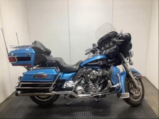 2011 Harley-Davidson Flhtcu UL CLSC EL Glide Motorcycle, 1584cc, 96 cubic inch V-Twin, 2 cylinder, manual, belt drive, cruise control, AM/FM radio, CD player, tour pack with luggage rack, lower fairing, highway pegs, passenger floor boards, blue exterior. $8,940.00 plus $375 processing fee, $9,315.00 total payment obligation before taxes.  Listing report, warranty, contract commitment cancellation fee, financing available on approved credit (some limitations and exceptions may apply). All above specifications and information is considered to be accurate but is not guaranteed and no opinion or advice is given as to whether this item should be purchased. We do not allow test drives due to theft, fraud and acts of vandalism. Instead we provide the following benefits: Complimentary Warranty (with options to extend), Limited Money Back Satisfaction Guarantee on Fully Completed Contracts, Contract Commitment Cancellation, and an Open-Ended Sell-Back Option. Ask seller for details or call 604-522-REPO(7376) to confirm listing availability.