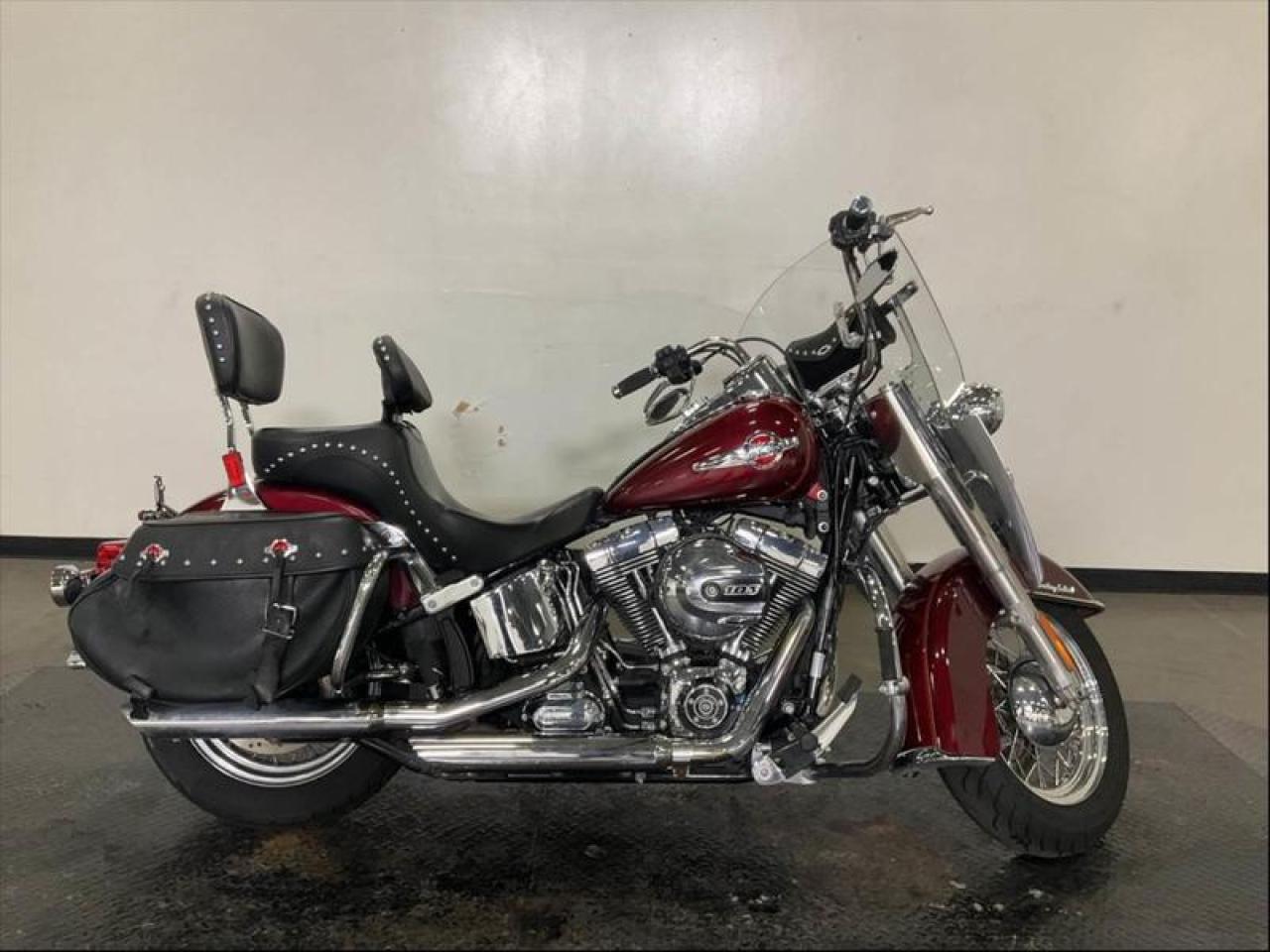 2017 Harley-Davidson Flstci Heritage Softail Classic Motorcycle, 1690cc, 103 cubic inch V-Twin, 2 cylinder, manual, ABS brakes, belt drive, rider and passenger back rests, removable windshield, saddle bags, highway pegs, red exterior. $14,150.00 plus $375 processing fee, $14,525.00 total payment obligation before taxes. Sale price until January 13, 2024, 6:00 PM PST. Listing report, warranty, contract commitment cancellation fee, financing available on approved credit (some limitations and exceptions may apply). All above specifications and information is considered to be accurate but is not guaranteed and no opinion or advice is given as to whether this item should be purchased. We do not allow test drives due to theft, fraud and acts of vandalism. Instead we provide the following benefits: Complimentary Warranty (with options to extend), Limited Money Back Satisfaction Guarantee on Fully Completed Contracts, Contract Commitment Cancellation, and an Open-Ended Sell-Back Option. Ask seller for details or call 604-522-REPO(7376) to confirm listing availability.