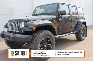 <p><strong>SALE PRICED EXCELLENT CONDITION UPGRADED WHEELS AND TIRES. LOW KM</strong> .</p>

<p>Our Jeep Wrangler Unlimited Sahara has been through a <strong>presale inspection fresh full synthetic oil service. Carfax reports no serious collisions Low Km. Financing available on site Trades Encouraged. Aftermarket warranties available to fit every need and budget.</strong> Redesigned for 2018, the Jeep Wrangler is more than just a dominating force off-road. 3.6-liter V6 (285 horsepower, 260 pound-feet of torque) is standard across the board. By default, its paired to a six-speed manual transmission. full-size spare tire, skid plates and tow hooks. It also has foglights, keyless entry,cruise control, air conditioning, cloth upholstery, a tilt-and-telescoping steering wheel, . Bluetooth, an eight-speaker sound system with a USB port and an auxiliary audio jack. Besides its two extra doors, the Unlimited version also has a bigger gas tank, air conditioning, and a 60/40-split folding rear seat. Sport S adds, air conditioning, automatic headlights, keyless entry, heated power mirrors, power windows and locks, an alarm, a leather-wrapped steering wheel, and sun visors with vanity mirrors. Sahara is only available in the four-door configuration and adds to the Sport S with painted exterior body panels and trim, automatic headlights, automatic climate control and a 115-volt outlet. It also comes with a bigger driver information display, an additional USB port, and an upgraded version of Uconnect with a 7-inch touchscreen, Android Auto and Apple CarPlay smartphone integration, and satellite radio. Heated seats.</p>

<p><span style=color:#2980b9><strong>Siman Auto Sales is large enough to make a difference but small enough to care. We are family owned and operated, and have been proudly serving Saskatchewan car buyers since 1998. We offer on site financing, consignment, automotive repair and over 90 preowned vehicles to choose from.</strong></span></p>