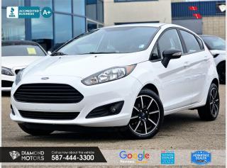 1.6L 4 CYLINDER ENGINE, HEATED SEATS, APPLE CARPLAY/ANDROID AUTO, BACKUP CAMERAA, REMOTE STARTER, BRAND NEW WINTER TIRES, CRUISE CONTROL AND MUCH MORE! <br/> <br/>  <br/> Just Arrived 2019 Ford Fiesta SE White has 97,103 KM on it. 1.6L 4 Cylinder Engine engine, Front-Wheel Drive, Automatic transmission, 5 Seater passengers, on special price for $16,500.00. <br/> <br/>  <br/> Book your appointment today for Test Drive. We offer contactless Test drives & Virtual Walkarounds. Stock Number: 23290 <br/> <br/>  <br/> Diamond Motors has built a reputation for serving you, our customers. Being honest and selling quality pre-owned vehicles at competitive & affordable prices. Whenever you deal with us, you know you get to deal and speak directly with the owners. This means unique personalized customer service to meet all your needs. No high-pressure sales tactics, only upfront advice. <br/> <br/>  <br/> Why choose us? <br/>  <br/> Certified Pre-Owned Vehicles <br/> Family Owned & Operated <br/> Finance Available <br/> Extended Warranty <br/> Vehicles Priced to Sell <br/> No Pressure Environment <br/> Inspection & Carfax Report <br/> Professionally Detailed Vehicles <br/> Full Disclosure Guaranteed <br/> AMVIC Licensed <br/> BBB Accredited Business <br/> CarGurus Top-rated Dealer 2022 <br/> <br/>  <br/> Phone to schedule an appointment @ 587-444-3300 or simply browse our inventory online www.diamondmotors.ca or come and see us at our location at <br/> 3403 93 street NW, Edmonton, T6E 6A4 <br/> <br/>  <br/> To view the rest of our inventory: <br/> www.diamondmotors.ca/inventory <br/> <br/>  <br/> All vehicle features must be confirmed by the buyer before purchase to confirm accuracy. All vehicles have an inspection work order and accompanying Mechanical fitness assessment. All vehicles will also have a Carproof report to confirm vehicle history, accident history, salvage or stolen status, and jurisdiction report. <br/>