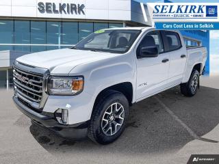 <b>Heated Seats,  Remote Start,  Off-Road Suspension,  Aluminum Wheels,  Apple CarPlay!</b><br> <br>  SPECIAL!  Was $45490. Now $39999! $5491 discount for a limited time!  <br> <br/>   This GMC Canyon offers an exceptionally quiet and roomy interior that is further complemented with premium professional grade materials. This  2021 GMC Canyon is for sale today in Selkirk. <br> <br>This GMC Canyon is built around the idea of a all-in-one work truck, providing the durability and premium detail you expect from a Professional Grade GMC pickup. Capable, versatile and entirely refined, this redesigned mid-size Canyon balances power and technology in a package that is spacious and efficient. Whether you need a pickup truck for some occasional hauling, off-road fun, or you just want to have a pickup truck, this premium GMC Canyon fits the bill. It has almost as much capability as its bigger counterparts, but its easier to maneuver, easier to park, and will provide you with better fuel economy. Where ever you and your family go, go confidently in this GMC Canyon that personifies GMCs attitude and dedication to precision.This  Crew Cab 4X4 pickup  has 79,109 kms. Its  white in colour  . It has an automatic transmission and is powered by a  308HP 3.6L V6 Cylinder Engine.  This unit has some remaining factory warranty for added peace of mind. <br> <br> Our Canyons trim level is AT4. Upgrading to this 2021 Canyon AT4 is a great choice as it comes loaded with more features like an off-road suspension, heated front seats and an automatic locking rear differential with an advanced hill descent control, automatic climate control, a remote vehicle starter system and unique exterior and interior features such as red recovery hooks. This Canyon also includes an EZ lift and lower tailgate, front fog lamps, 4G WiFi, GMC Connected Access, a leather-wrapped steering wheel with audio controls and remote keyless entry. It even includes unique aluminum wheels, signature LED lamps, a large 8 inch touchscreen display paired with Apple CarPlay and Android Auto, StabiliTrak with trailer sway control, unique CornerStep rear bumper, traction control and a 6-way power driver seat plus much more. This vehicle has been upgraded with the following features: Heated Seats,  Remote Start,  Off-road Suspension,  Aluminum Wheels,  Apple Carplay,  Android Auto,  Ez Lift Tailgate. <br> <br>To apply right now for financing use this link : <a href=https://www.selkirkchevrolet.com/pre-qualify-for-financing/ target=_blank>https://www.selkirkchevrolet.com/pre-qualify-for-financing/</a><br><br> <br/><br>Selkirk Chevrolet Buick GMC Ltd carries an impressive selection of new and pre-owned cars, crossovers and SUVs. No matter what vehicle you might have in mind, weve got the perfect fit for you. If youre looking to lease your next vehicle or finance it, we have competitive specials for you. We also have an extensive collection of quality pre-owned and certified vehicles at affordable prices. Winnipeg GMC, Chevrolet and Buick shoppers can visit us in Selkirk for all their automotive needs today! We are located at 1010 MANITOBA AVE SELKIRK, MB R1A 3T7 or via phone at 204-482-1010.<br> Come by and check out our fleet of 80+ used cars and trucks and 170+ new cars and trucks for sale in Selkirk.  o~o