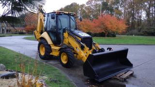 2011 Caterpillar 420E IT Backhoe Loader Forks and Bucket, 4x4 With Rear Stabilizers Diesel, 1 door, automatic, air conditioning, Air suspension seat, 8 working lights, new gauge cluster, joystick controls, Pilot. operated stabilizer, 3054C  Direct Injection Turbocharged engine, single tilt loader linkage, loader controls, tilt up hood, backup alarm,  deluxe cab with air conditioning, flow sharing Hydraulic valves, smoother shifts, ride control system, flip over stabilizer,   yellow exterior, black interior, cloth. Hour metre changed by caterpillar at 6415 hours plus 257 hours = 6630 total hours. $59,810.00 plus $375 processing fee, $60,185.00 total payment obligation before taxes.  Listing report, warranty, contract commitment cancellation fee, financing available on approved credit (some limitations and exceptions may apply). All above specifications and information is considered to be accurate but is not guaranteed and no opinion or advice is given as to whether this item should be purchased. We do not allow test drives due to theft, fraud and acts of vandalism. Instead we provide the following benefits: Complimentary Warranty (with options to extend), Limited Money Back Satisfaction Guarantee on Fully Completed Contracts, Contract Commitment Cancellation, and an Open-Ended Sell-Back Option. Ask seller for details or call 604-522-REPO(7376) to confirm listing availability.