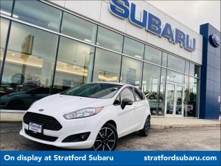 <div>Discover a driving experience like never before with the Ford Fiesta, where innovation meets comfort. This compact marvel comes equipped with a stunning, large screen that seamlessly integrates Apple CarPlay and Android Auto, ensuring you stay connected effortlessly.</div><div> </div><div><strong>Key Features:</strong></div><div> </div><div>Smart Connectivity: Sync your smartphone effortlessly with Apple CarPlay and Android Auto on a vibrant, large screen.<br /> </div><div>Entertainment on-the-go: Enjoy the luxury of Bluetooth, SiriusXM Radio, and multiple AUX ports, providing you with versatile entertainment options for every journey.<br /> </div><div><strong>Comfort and Convenience:</strong></div><div> </div><div>Heated Seats: Experience warmth and comfort during chilly drives.<br /> </div><div>Effortless Driving: Cruise control, and power steering make every drive a breeze.<br /> </div><div>Safety First: Advanced safety features like Anti-Lock Brakes, Traction Control, and a Rearview Camera ensure your peace of mind.<br /> </div><div><strong>Modern Design:</strong></div><div> </div><div>Sleek Alloy Wheels: Enhance the visual appeal while ensuring a smooth ride.</div><br />Our experienced sales staff is eager to share its knowledge and enthusiasm with you. We'd be happy to answer any questions that you may have. Call now to schedule a test drive. We pride ourselves on providing excellent customer service. Please don't hesitate to give us a call. UpAuto has lots of inventory, this vehicle is on display at STRATFORD SUBARU in STRATFORD. Please reach out with any inquiries, either through this listing or call us. Price plus HST & Licensing. Our Hours are: Monday: 9:00am-6:00pm / Tuesday: 9:00am-6:00pm / Wednesday: 9:00am-6:00pm / Thursday: 9:00am-6:00pm / Friday: 9:00am-6:00pm / Saturday: 9:00am-4:00pm / Sunday: Closed We look forward to serving you soon! HST AND LICENSING EXTRA..SEE DEALER FOR DETAILS