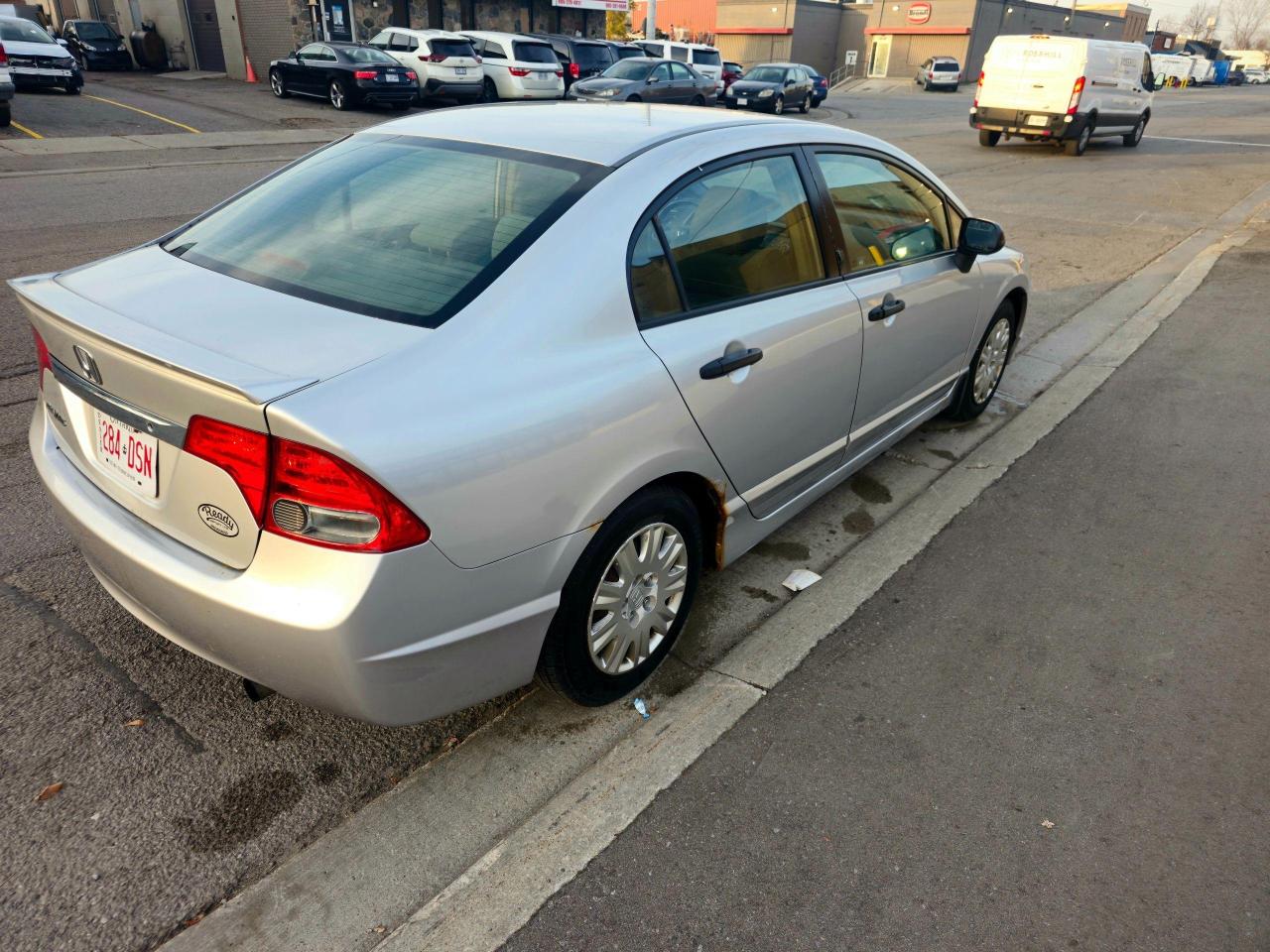 2009 Honda Civic 4dr Auto DX Photo2