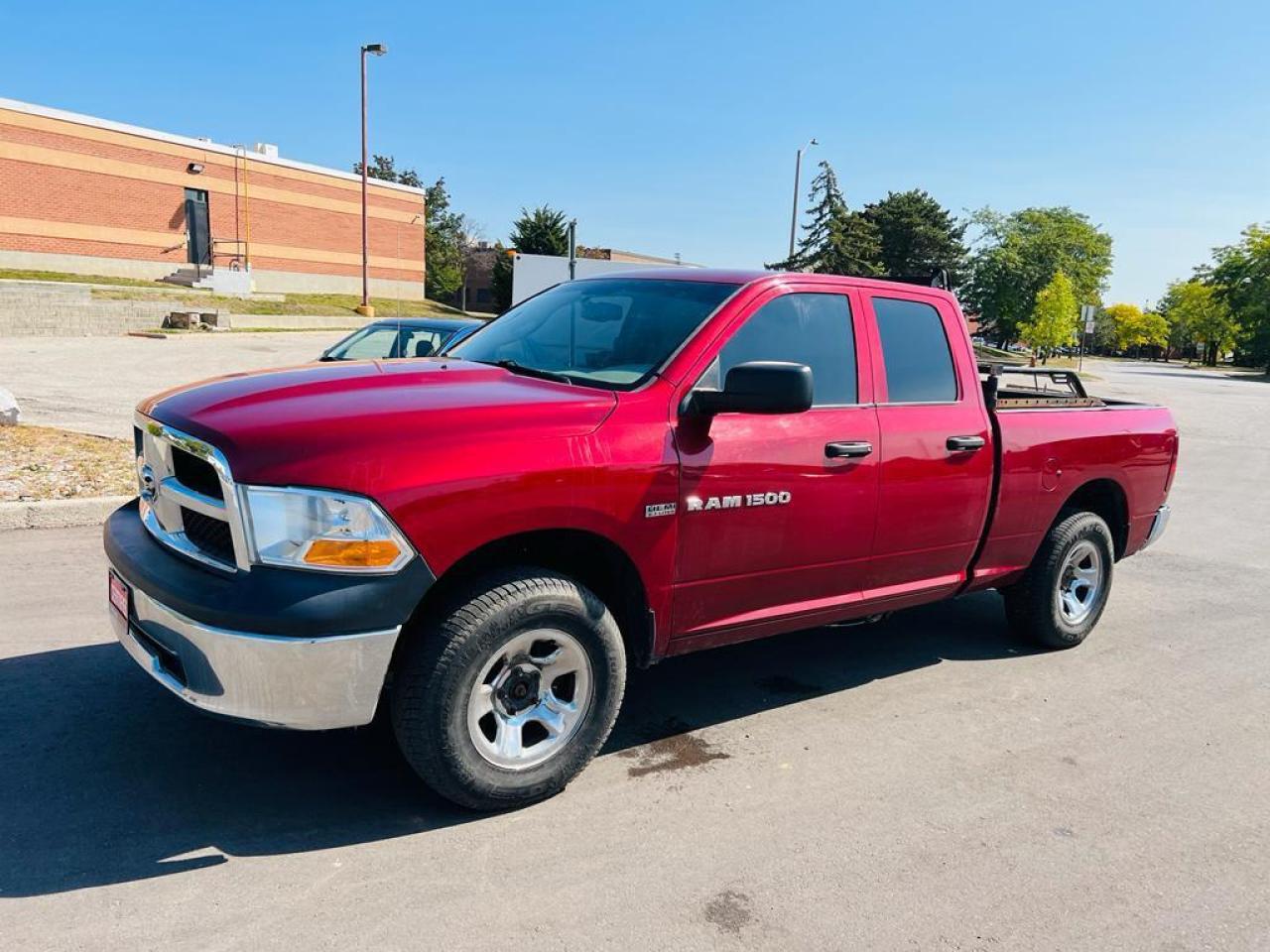 Used 2012 RAM 1500 4WD QUAD CAB 140.5