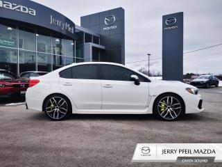 Prepare to unleash the thrill of performance with the 2020 Subaru WRX STI Sport-tech, a dynamic and sporty sedan ready to conquer the roads at Jerry Pfeil Mazda. <br><br>
The exterior of the Subaru WRX STI Sport-tech is a testament to its rally-inspired heritage, featuring aggressive lines, a distinctive hood scoop, and a prominent rear spoiler. The Sport-tech trim adds exclusive details, including stylish alloy wheels and signature STI badging, enhancing the WRXs visual appeal and hinting at its high-performance capabilities. <br><br>
Step inside the cockpit, and youll find a driver-centric interior designed for maximum control and comfort. The WRX STI Sporttech features supportive and well-bolstered seats, premium materials, and a user-friendly infotainment system. The advanced technology, including the Subaru Starlink infotainment system displayed on a touchscreen, seamlessly integrates with navigation, entertainment, and connectivity features, ensuring a connected and enjoyable ride. <br><br>
Beneath the hood, the 2020 Subaru WRX STI Sport-tech is equipped with a potent turbocharged engine that delivers exhilarating acceleration and precise handling. The Subaru Symmetrical All-Wheel Drive system, sport-tuned suspension, and responsive steering contribute to an unparalleled driving experience, making every corner an opportunity for excitement. <br><br>
Jerry Pfeil Mazda invites you to experience the 2020 Subaru WRX STI Sport-tech by scheduling a test drive. <br><br>