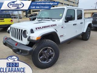 <b>Leather Seats, Heated Seats, Body Color 3-Piece Hard Top!</b><br> <br> <br> <br>  Complete with a cargo bed and removable panels for an open air experience, you can have your Jeep and haul with it too. <br> <br>Built with unmistakable Jeep styling and off-road capability and the capability and hauling power of a pickup truck, you get the best of both worlds with this incredible machine. Thanks to its unmistakable style, rugged off-road technology, and an exhilarating open air truck experience, this unique Jeep Gladiator is ready to change the 4X4 game.<br> <br> This bright white Regular Cab 4X4 pickup   has an automatic transmission and is powered by a  285HP 3.6L V6 Cylinder Engine.<br> <br> Our Gladiators trim level is Rubicon. Sitting at the top of the Gladiator range, this Rubicon trim is fully loaded with FOX premium dampers, 7 skid plates, heavy-duty suspension, a manual Targa composite first-row sunroof, a 9-speaker Alpine premium audio setup, voice-activated navigation, dual-zone climate control, class III towing equipment with a trailer wiring harness and trailer sway control, a full-size spare with underbody storage, removable doors and windows, and a manual convertible top with fixed roll-over protection. This rugged truck also features great convenience features like proximity keyless entry with push button start, illuminated front and rear cupholders, two 12-volt DC and a 120-volt AC power outlets, and tons of storage space. Handling infotainment and connectivity duties is an 8.4-inch screen powered by Uconnect 4, and features Apple CarPlay, Android Auto, 4G LTE WiFi hotspot internet access, and streaming audio. This vehicle has been upgraded with the following features: Leather Seats, Heated Seats, Body Color 3-piece Hard Top. <br><br> View the original window sticker for this vehicle with this url <b><a href=http://www.chrysler.com/hostd/windowsticker/getWindowStickerPdf.do?vin=1C6JJTBG4PL526676 target=_blank>http://www.chrysler.com/hostd/windowsticker/getWindowStickerPdf.do?vin=1C6JJTBG4PL526676</a></b>.<br> <br>To apply right now for financing use this link : <a href=https://standarddodge.ca/financing target=_blank>https://standarddodge.ca/financing</a><br><br> <br/><br>* Visit Us Today *Youve earned this - stop by Standard Chrysler Dodge Jeep Ram located at 208 Cheadle St W., Swift Current, SK S9H0B5 to make this car yours today! <br> Pricing may not reflect additional accessories that have been added to the advertised vehicle<br><br> Come by and check out our fleet of 30+ used cars and trucks and 130+ new cars and trucks for sale in Swift Current.  o~o