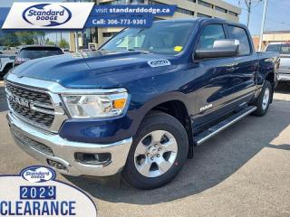 <b>5.7L V8 HEMI MDS VVT eTorque Engine, Trailer Tow Group!</b><br> <br> <br> <br>  Make light work of tough jobs in this 2023 Ram 1500, with exceptional towing, torque and payload capability. <br> <br>The Ram 1500s unmatched luxury transcends traditional pickups without compromising its capability. Loaded with best-in-class features, its easy to see why the Ram 1500 is so popular. With the most towing and hauling capability in a Ram 1500, as well as improved efficiency and exceptional capability, this truck has the grit to take on any task.<br> <br> This patriot blue pearl coat Crew Cab 4X4 pickup   has a 8 speed automatic transmission and is powered by a  395HP 5.7L 8 Cylinder Engine.<br> <br> Our 1500s trim level is Big Horn. This Ram 1500 Bighorn comes with stylish aluminum wheels, a leather steering wheel, class II towing equipment including a hitch, wiring harness and trailer sway control, heavy-duty suspension, cargo box lighting, and a locking tailgate. Additional features include heated and power adjustable side mirrors, UCconnect 3, hands-free phone communication, push button start, cruise control, air conditioning, vinyl floor lining, and a rearview camera. This vehicle has been upgraded with the following features: 5.7l V8 Hemi Mds Vvt Etorque Engine, Trailer Tow Group. <br><br> View the original window sticker for this vehicle with this url <b><a href=http://www.chrysler.com/hostd/windowsticker/getWindowStickerPdf.do?vin=1C6SRFFT6PN653682 target=_blank>http://www.chrysler.com/hostd/windowsticker/getWindowStickerPdf.do?vin=1C6SRFFT6PN653682</a></b>.<br> <br>To apply right now for financing use this link : <a href=https://standarddodge.ca/financing target=_blank>https://standarddodge.ca/financing</a><br><br> <br/><br>* Visit Us Today *Youve earned this - stop by Standard Chrysler Dodge Jeep Ram located at 208 Cheadle St W., Swift Current, SK S9H0B5 to make this car yours today! <br> Pricing may not reflect additional accessories that have been added to the advertised vehicle<br><br> Come by and check out our fleet of 30+ used cars and trucks and 120+ new cars and trucks for sale in Swift Current.  o~o