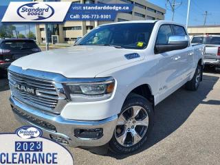 <b>5.7L V8 HEMI MDS VVT eTorque Engine, Leather Seats, 20 inch Aluminum Wheels, Trailer Hitch, Trailer Tow Group!</b><br> <br> <br> <br>  Make light work of tough jobs in this 2023 Ram 1500, with exceptional towing, torque and payload capability. <br> <br>The Ram 1500s unmatched luxury transcends traditional pickups without compromising its capability. Loaded with best-in-class features, its easy to see why the Ram 1500 is so popular. With the most towing and hauling capability in a Ram 1500, as well as improved efficiency and exceptional capability, this truck has the grit to take on any task.<br> <br> This ivory tri-coat pearl Crew Cab 4X4 pickup   has a 8 speed automatic transmission and is powered by a  395HP 5.7L 8 Cylinder Engine.<br> <br> Our 1500s trim level is Laramie. Step up to this Ram 1500 Laramie and be rewarded with ventilated and heated front seats with power adjustment, lumbar support and memory function, remote engine start, a leather-wrapped steering wheel, power-adjustable pedals, interior sound insulation, simulated wood/metal interior trim, and dual-zone front climate control with infrared. This truck is also ready for work, with class III towing equipment including a hitch, wiring harness and trailer sway control, heavy duty suspension, power-folding exterior side mirrors with convex wide-angle inserts, and a locking tailgate. Connectivity is handled via an 8.4-inch screen powered by Uconnect 5 with GPS navigation, Apple CarPlay, Android Auto, SiriusXM satellite radio, and 4G LTE wi-fi hotspot.  This vehicle has been upgraded with the following features: 5.7l V8 Hemi Mds Vvt Etorque Engine, Leather Seats, 20 Inch Aluminum Wheels, Trailer Hitch, Trailer Tow Group. <br><br> View the original window sticker for this vehicle with this url <b><a href=http://www.chrysler.com/hostd/windowsticker/getWindowStickerPdf.do?vin=1C6SRFJT9PN632297 target=_blank>http://www.chrysler.com/hostd/windowsticker/getWindowStickerPdf.do?vin=1C6SRFJT9PN632297</a></b>.<br> <br>To apply right now for financing use this link : <a href=https://standarddodge.ca/financing target=_blank>https://standarddodge.ca/financing</a><br><br> <br/><br>* Visit Us Today *Youve earned this - stop by Standard Chrysler Dodge Jeep Ram located at 208 Cheadle St W., Swift Current, SK S9H0B5 to make this car yours today! <br> Pricing may not reflect additional accessories that have been added to the advertised vehicle<br><br> Come by and check out our fleet of 30+ used cars and trucks and 110+ new cars and trucks for sale in Swift Current.  o~o