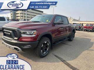 <b>Off-Road Suspension,  SiriusXM,  Apple CarPlay,  Android Auto,  Navigation!</b><br> <br> <br> <br>  Beauty meets brawn with this rugged Ram 1500. <br> <br>The Ram 1500s unmatched luxury transcends traditional pickups without compromising its capability. Loaded with best-in-class features, its easy to see why the Ram 1500 is so popular. With the most towing and hauling capability in a Ram 1500, as well as improved efficiency and exceptional capability, this truck has the grit to take on any task.<br> <br> This red pearl Crew Cab 4X4 pickup   has a 8 speed automatic transmission and is powered by a  395HP 5.7L 8 Cylinder Engine.<br> <br> Our 1500s trim level is Rebel. Bold and unapologetic, this Ram 1500 Rebel features beefy off-road suspension including Bilstein dampers, skid plates for underbody protection, gloss black wheels, front fog lamps, power-folding exterior mirrors with courtesy lamps, and black fender flares, with front bumper tow hooks. The standard features continue, with power-adjustable heated front seats with lumbar support, dual-zone climate control, power-adjustable pedals, deluxe sound insulation, and a leather-wrapped steering wheel. Connectivity is handled by an upgraded 8.4-inch display powered by Uconnect 5 with inbuilt navigation, mobile internet hotspot access, Apple CarPlay, Android Auto and SiriusXM streaming radio. Additional features include a power rear window with defrosting, class II towing equipment including a hitch, wiring harness and trailer sway control, heavy-duty suspension, cargo box lighting, and a locking tailgate. This vehicle has been upgraded with the following features: Off-road Suspension,  Siriusxm,  Apple Carplay,  Android Auto,  Navigation,  Heated Seats,  4g Wi-fi. <br><br> View the original window sticker for this vehicle with this url <b><a href=http://www.chrysler.com/hostd/windowsticker/getWindowStickerPdf.do?vin=1C6SRFLT7PN688171 target=_blank>http://www.chrysler.com/hostd/windowsticker/getWindowStickerPdf.do?vin=1C6SRFLT7PN688171</a></b>.<br> <br>To apply right now for financing use this link : <a href=https://standarddodge.ca/financing target=_blank>https://standarddodge.ca/financing</a><br><br> <br/><br>* Visit Us Today *Youve earned this - stop by Standard Chrysler Dodge Jeep Ram located at 208 Cheadle St W., Swift Current, SK S9H0B5 to make this car yours today! <br> Pricing may not reflect additional accessories that have been added to the advertised vehicle<br><br> Come by and check out our fleet of 30+ used cars and trucks and 120+ new cars and trucks for sale in Swift Current.  o~o