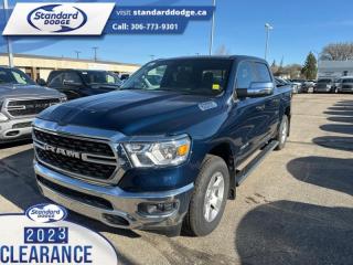 <b>5.7L V8 HEMI MDS VVT eTorque Engine!</b><br> <br> <br> <br>  Discover the inner beauty and rugged exterior of this stylish Ram 1500. <br> <br>The Ram 1500s unmatched luxury transcends traditional pickups without compromising its capability. Loaded with best-in-class features, its easy to see why the Ram 1500 is so popular. With the most towing and hauling capability in a Ram 1500, as well as improved efficiency and exceptional capability, this truck has the grit to take on any task.<br> <br> This patriot blue pearl coat Crew Cab 4X4 pickup   has a 8 speed automatic transmission and is powered by a  395HP 5.7L 8 Cylinder Engine.<br> <br> Our 1500s trim level is Big Horn. This Ram 1500 Bighorn comes with stylish aluminum wheels, a leather steering wheel, class II towing equipment including a hitch, wiring harness and trailer sway control, heavy-duty suspension, cargo box lighting, and a locking tailgate. Additional features include heated and power adjustable side mirrors, UCconnect 3, hands-free phone communication, push button start, cruise control, air conditioning, vinyl floor lining, and a rearview camera. This vehicle has been upgraded with the following features: 5.7l V8 Hemi Mds Vvt Etorque Engine. <br><br> View the original window sticker for this vehicle with this url <b><a href=http://www.chrysler.com/hostd/windowsticker/getWindowStickerPdf.do?vin=1C6SRFFT5PN703892 target=_blank>http://www.chrysler.com/hostd/windowsticker/getWindowStickerPdf.do?vin=1C6SRFFT5PN703892</a></b>.<br> <br>To apply right now for financing use this link : <a href=https://standarddodge.ca/financing target=_blank>https://standarddodge.ca/financing</a><br><br> <br/><br>* Visit Us Today *Youve earned this - stop by Standard Chrysler Dodge Jeep Ram located at 208 Cheadle St W., Swift Current, SK S9H0B5 to make this car yours today! <br> Pricing may not reflect additional accessories that have been added to the advertised vehicle<br><br> Come by and check out our fleet of 30+ used cars and trucks and 110+ new cars and trucks for sale in Swift Current.  o~o