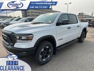 <b>Leather Seats, 5.7L V8 HEMI MDS VVT eTorque Engine, Trailer Hitch!</b><br> <br> <br> <br>  Discover the inner beauty and rugged exterior of this stylish Ram 1500. <br> <br>The Ram 1500s unmatched luxury transcends traditional pickups without compromising its capability. Loaded with best-in-class features, its easy to see why the Ram 1500 is so popular. With the most towing and hauling capability in a Ram 1500, as well as improved efficiency and exceptional capability, this truck has the grit to take on any task.<br> <br> This bright white Crew Cab 4X4 pickup   has a 8 speed automatic transmission and is powered by a  395HP 5.7L 8 Cylinder Engine.<br> <br> Our 1500s trim level is Rebel. Bold and unapologetic, this Ram 1500 Rebel features beefy off-road suspension including Bilstein dampers, skid plates for underbody protection, gloss black wheels, front fog lamps, power-folding exterior mirrors with courtesy lamps, and black fender flares, with front bumper tow hooks. The standard features continue, with power-adjustable heated front seats with lumbar support, dual-zone climate control, power-adjustable pedals, deluxe sound insulation, and a leather-wrapped steering wheel. Connectivity is handled by an upgraded 8.4-inch display powered by Uconnect 5 with inbuilt navigation, mobile internet hotspot access, Apple CarPlay, Android Auto and SiriusXM streaming radio. Additional features include a power rear window with defrosting, class II towing equipment including a hitch, wiring harness and trailer sway control, heavy-duty suspension, cargo box lighting, and a locking tailgate. This vehicle has been upgraded with the following features: Leather Seats, 5.7l V8 Hemi Mds Vvt Etorque Engine, Trailer Hitch. <br><br> View the original window sticker for this vehicle with this url <b><a href=http://www.chrysler.com/hostd/windowsticker/getWindowStickerPdf.do?vin=1C6SRFLT9PN696823 target=_blank>http://www.chrysler.com/hostd/windowsticker/getWindowStickerPdf.do?vin=1C6SRFLT9PN696823</a></b>.<br> <br>To apply right now for financing use this link : <a href=https://standarddodge.ca/financing target=_blank>https://standarddodge.ca/financing</a><br><br> <br/><br>* Visit Us Today *Youve earned this - stop by Standard Chrysler Dodge Jeep Ram located at 208 Cheadle St W., Swift Current, SK S9H0B5 to make this car yours today! <br> Pricing may not reflect additional accessories that have been added to the advertised vehicle<br><br> Come by and check out our fleet of 30+ used cars and trucks and 120+ new cars and trucks for sale in Swift Current.  o~o