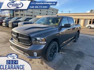 <b>Express Value Package, Sub Zero Package, Mopar Sport Performance Hood, Trailer Hitch!</b><br> <br> <br> <br>  This Ram 1500 Classic is a top contender in the full-size pickup segment thanks to a winning combination of a strong powertrain, a smooth ride and a well-trimmed cabin. <br> <br>The reasons why this Ram 1500 Classic stands above its well-respected competition are evident: uncompromising capability, proven commitment to safety and security, and state-of-the-art technology. From its muscular exterior to the well-trimmed interior, this 2023 Ram 1500 Classic is more than just a workhorse. Get the job done in comfort and style while getting a great value with this amazing full-size truck. <br> <br> This granite crystal metallic Crew Cab 4X4 pickup   has a 8 speed automatic transmission and is powered by a  395HP 5.7L 8 Cylinder Engine.<br> <br> Our 1500 Classics trim level is Express. This Ram 1500 Express features upgraded aluminum wheels, front fog lamps and USB connectivity, along with a great selection of standard features such as class II towing equipment including a hitch, wiring harness and trailer sway control, heavy-duty suspension, cargo box lighting, and a locking tailgate. Additional features include heated and power adjustable side mirrors, UCconnect 3, cruise control, air conditioning, vinyl floor lining, and a rearview camera. This vehicle has been upgraded with the following features: Express Value Package, Sub Zero Package, Mopar Sport Performance Hood, Trailer Hitch. <br><br> View the original window sticker for this vehicle with this url <b><a href=http://www.chrysler.com/hostd/windowsticker/getWindowStickerPdf.do?vin=3C6RR7KT2PG667937 target=_blank>http://www.chrysler.com/hostd/windowsticker/getWindowStickerPdf.do?vin=3C6RR7KT2PG667937</a></b>.<br> <br>To apply right now for financing use this link : <a href=https://standarddodge.ca/financing target=_blank>https://standarddodge.ca/financing</a><br><br> <br/><br>* Visit Us Today *Youve earned this - stop by Standard Chrysler Dodge Jeep Ram located at 208 Cheadle St W., Swift Current, SK S9H0B5 to make this car yours today! <br> Pricing may not reflect additional accessories that have been added to the advertised vehicle<br><br> Come by and check out our fleet of 30+ used cars and trucks and 120+ new cars and trucks for sale in Swift Current.  o~o