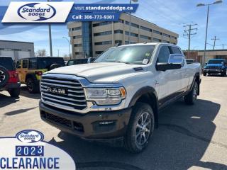 <b>6.7 Cummins HO Turbo Diesel, Sunroof, Longhorn Level 1 Equipment Group, Premium Leather Bucket Seats, Auto Leveling Rear Air Suspension!</b><br> <br> <br> <br>  Get the job done in comfort and style in this extremely capable Ram 3500 HD. <br> <br>Endlessly capable, this 2024 Ram 3500HD pulls out all the stops, and has the towing capacity that sets it apart from the competition. On top of its proven Ram toughness, this Ram 3500HD has an ultra-quiet cabin full of amazing tech features that help make your workday more enjoyable. Whether youre in the commercial sector or looking for serious recreational towing rig, this impressive 3500HD is ready for anything that you are.<br> <br> This pearl white                    sought after diesel Crew Cab 4X4 pickup   has a 6 speed automatic transmission and is powered by a Cummins 400HP 6.7L Straight 6 Cylinder Engine.<br> <br> Our 3500s trim level is Longhorn. Stepping up to this Ram 3500 Longhorn rewards you with ventilated and heated and power-adjustable front seats with lumbar support, heated second row seats, power extendable trailer style side mirrors and side steps, and is also well equipped with class V towing equipment including a hitch, brake controller and trailer sway control, heavy duty suspension, front and reverse utility lights, cargo box lighting, and a rear step bumper. On the inside, occupants are treated to leather upholstery, dual-zone front automatic air conditioning, a genuine wood/leather-wrapped steering wheel, and illuminated front cupholders. Stay connected on the road via an 8.4-inch display powered by Uconnect 5 with GPS navigation, HD radio, Apple CarPlay and Android Auto, Alexa Built-In, SiriusXM streaming radio, trailer tow pages, off-road info pages, and mobile hotspot internet access. Additional features include a 10-speaker Alpine audio system, 115-volt rear auxiliary power outlet, remote engine start, and even more! This vehicle has been upgraded with the following features: 6.7 Cummins Ho Turbo Diesel, Sunroof, Longhorn Level 1 Equipment Group, Premium Leather Bucket Seats, Auto Leveling Rear Air Suspension, Towing Technology Group, 20 Inch Aluminum Wheels. <br><br> View the original window sticker for this vehicle with this url <b><a href=http://www.chrysler.com/hostd/windowsticker/getWindowStickerPdf.do?vin=3C63R3FL8RG147849 target=_blank>http://www.chrysler.com/hostd/windowsticker/getWindowStickerPdf.do?vin=3C63R3FL8RG147849</a></b>.<br> <br>To apply right now for financing use this link : <a href=https://standarddodge.ca/financing target=_blank>https://standarddodge.ca/financing</a><br><br> <br/><br>* Visit Us Today *Youve earned this - stop by Standard Chrysler Dodge Jeep Ram located at 208 Cheadle St W., Swift Current, SK S9H0B5 to make this car yours today! <br> Pricing may not reflect additional accessories that have been added to the advertised vehicle<br><br> Come by and check out our fleet of 30+ used cars and trucks and 110+ new cars and trucks for sale in Swift Current.  o~o
