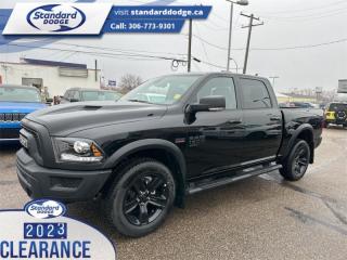 <b>Mopar Sport Performance Hood, Heated Seats, Luxury Group, Technology Package, Remote Engine Start!</b><br> <br> <br> <br>  This Ram 1500 Classic is a top contender in the full-size pickup segment thanks to a winning combination of a strong powertrain, a smooth ride and a well-trimmed cabin. <br> <br>The reasons why this Ram 1500 Classic stands above its well-respected competition are evident: uncompromising capability, proven commitment to safety and security, and state-of-the-art technology. From its muscular exterior to the well-trimmed interior, this 2023 Ram 1500 Classic is more than just a workhorse. Get the job done in comfort and style while getting a great value with this amazing full-size truck. <br> <br> This diamond black crystal pearlcoat Crew Cab 4X4 pickup   has a 8 speed automatic transmission and is powered by a  395HP 5.7L 8 Cylinder Engine.<br> <br> Our 1500 Classics trim level is Warlock. This Ram 1500 Warlock comes with high gloss black aluminum wheels, active aero shutters, sound insulation, proximity keyless entry and USB connectivity, along with a great selection of standard features such as class II towing equipment including a hitch, wiring harness and trailer sway control, heavy-duty suspension, cargo box lighting, and a locking tailgate. Additional features include heated and power adjustable side mirrors, UCconnect 3, cruise control, air conditioning, vinyl floor lining, and a rearview camera. This vehicle has been upgraded with the following features: Mopar Sport Performance Hood, Heated Seats, Luxury Group, Technology Package, Remote Engine Start, Premium Audio, Running Boards . <br><br> View the original window sticker for this vehicle with this url <b><a href=http://www.chrysler.com/hostd/windowsticker/getWindowStickerPdf.do?vin=1C6RR7LT4PS597333 target=_blank>http://www.chrysler.com/hostd/windowsticker/getWindowStickerPdf.do?vin=1C6RR7LT4PS597333</a></b>.<br> <br>To apply right now for financing use this link : <a href=https://standarddodge.ca/financing target=_blank>https://standarddodge.ca/financing</a><br><br> <br/><br>* Visit Us Today *Youve earned this - stop by Standard Chrysler Dodge Jeep Ram located at 208 Cheadle St W., Swift Current, SK S9H0B5 to make this car yours today! <br> Pricing may not reflect additional accessories that have been added to the advertised vehicle<br><br> Come by and check out our fleet of 30+ used cars and trucks and 120+ new cars and trucks for sale in Swift Current.  o~o