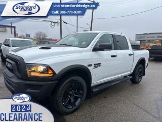 <b>Mopar Sport Performance Hood, Heated Seats, Luxury Group, Technology Package, Remote Engine Start!</b><br> <br> <br> <br>  This 2023 Ram 1500 Classic is the truck to have, thanks to its incredible powertrain and a well-appointed interior. <br> <br>The reasons why this Ram 1500 Classic stands above its well-respected competition are evident: uncompromising capability, proven commitment to safety and security, and state-of-the-art technology. From its muscular exterior to the well-trimmed interior, this 2023 Ram 1500 Classic is more than just a workhorse. Get the job done in comfort and style while getting a great value with this amazing full-size truck. <br> <br> This bright white Crew Cab 4X4 pickup   has a 8 speed automatic transmission and is powered by a  395HP 5.7L 8 Cylinder Engine.<br> <br> Our 1500 Classics trim level is Warlock. This Ram 1500 Warlock comes with high gloss black aluminum wheels, active aero shutters, sound insulation, proximity keyless entry and USB connectivity, along with a great selection of standard features such as class II towing equipment including a hitch, wiring harness and trailer sway control, heavy-duty suspension, cargo box lighting, and a locking tailgate. Additional features include heated and power adjustable side mirrors, UCconnect 3, cruise control, air conditioning, vinyl floor lining, and a rearview camera. This vehicle has been upgraded with the following features: Mopar Sport Performance Hood, Heated Seats, Luxury Group, Technology Package, Remote Engine Start, Premium Audio, Running Boards . <br><br> View the original window sticker for this vehicle with this url <b><a href=http://www.chrysler.com/hostd/windowsticker/getWindowStickerPdf.do?vin=1C6RR7LT6PS597334 target=_blank>http://www.chrysler.com/hostd/windowsticker/getWindowStickerPdf.do?vin=1C6RR7LT6PS597334</a></b>.<br> <br>To apply right now for financing use this link : <a href=https://standarddodge.ca/financing target=_blank>https://standarddodge.ca/financing</a><br><br> <br/><br>* Visit Us Today *Youve earned this - stop by Standard Chrysler Dodge Jeep Ram located at 208 Cheadle St W., Swift Current, SK S9H0B5 to make this car yours today! <br> Pricing may not reflect additional accessories that have been added to the advertised vehicle<br><br> Come by and check out our fleet of 30+ used cars and trucks and 120+ new cars and trucks for sale in Swift Current.  o~o