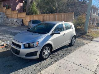 <p>WE ARE PLEASED TO BE ABLE TO OFFER THIS RECENT TRADE IT.</p><p> </p><p>2015 CHEVROLET SONIC LT HATCHBACK. DIRVES GREAT AND OVERALL GOOD CONDITION. SOME MINOR MARKS AND SMALL RUST. </p><p>ITS A MUST SEE!!! IN THIS MARKET IT IS VERY HARD TO OFFER AN INEXPENSIVE CAR IN THIS GOOD CONDITION.</p><p>* REVERSE CAMERA</p><p>* ONSTAR</p><p>*BLUETOOTH</p><p>*XM RADIO</p><p> </p><p>PLEASE CONTACT ROY 4165006821 TO ARRANGE YOUR PURCHASE.</p><p> </p><p>THE SELLING PRICE IS PLUS TAX, LICENICNG AND IS AS IS. WE DO OFFER CERTIFICATION FOR $695.00 PLUS TAX. IF THE PURCHASER DECLINES THE CERTIFICATION THEN THE FOLLOWING DISCLAIMER IS REQUIRED BY LAW...<span style=background-color: rgba(80, 151, 255, 0.18); color: #040c28; font-family: Google Sans, arial, sans-serif; font-size: 20px;>The motor vehicle sold under this contract is being sold “as-is” and is not represented as being in roadworthy condition, mechanically sound or maintained at any guaranteed level of quality</span><span style=color: #202124; font-family: Google Sans, arial, sans-serif; font-size: 20px; background-color: #ffffff;>.</span></p><p> </p><p><span style=color: #202124; font-family: Google Sans, arial, sans-serif; font-size: 20px; background-color: #ffffff;>THIS DISCLAIMER IS ONLY IF PURCHASED AS IS.</span></p><p> </p>