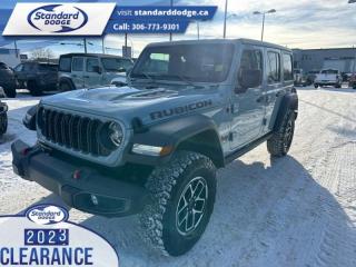 <b>Black 3-Piece Hard Top, Technology Group!</b><br> <br> <br> <br>  Whether youre concurring a highway mountain pass or challenging off-road trail, this reliable Jeep Wrangler is ready to get you there with style. <br> <br>No matter where your next adventure takes you, this Jeep Wrangler is ready for the challenge. With advanced traction and handling capability, sophisticated safety features and ample ground clearance, the Wrangler is designed to climb up and crawl over the toughest terrain. Inside the cabin of this Wrangler offers supportive seats and comes loaded with the technology you expect while staying loyal to the style and design youve come to know and love.<br> <br> This earl clear coat SUV  has a 8 speed automatic transmission and is powered by a  285HP 3.6L V6 Cylinder Engine.<br> <br> Our Wranglers trim level is Rubicon. Stepping up to this Wrangler Rubicon rewards you with incredible off-roading capability, thanks to heavy duty suspension, class II towing equipment that includes a hitch and trailer sway control, front active and rear anti-roll bars, upfitter switches, locking front and rear differentials, and skid plates for undercarriage protection. Interior features include an 8-speaker Alpine audio system, voice-activated dual zone climate control, front and rear cupholders, and a 12.3-inch infotainment system with smartphone integration and mobile internet hotspot access. Additional features include cruise control, a leatherette-wrapped steering wheel, proximity keyless entry, and even more. This vehicle has been upgraded with the following features: Black 3-piece Hard Top, Technology Group. <br><br> View the original window sticker for this vehicle with this url <b><a href=http://www.chrysler.com/hostd/windowsticker/getWindowStickerPdf.do?vin=1C4PJXFG5RW201475 target=_blank>http://www.chrysler.com/hostd/windowsticker/getWindowStickerPdf.do?vin=1C4PJXFG5RW201475</a></b>.<br> <br>To apply right now for financing use this link : <a href=https://standarddodge.ca/financing target=_blank>https://standarddodge.ca/financing</a><br><br> <br/><br>* Visit Us Today *Youve earned this - stop by Standard Chrysler Dodge Jeep Ram located at 208 Cheadle St W., Swift Current, SK S9H0B5 to make this car yours today! <br> Pricing may not reflect additional accessories that have been added to the advertised vehicle<br><br> Come by and check out our fleet of 30+ used cars and trucks and 120+ new cars and trucks for sale in Swift Current.  o~o