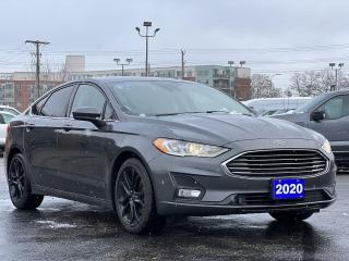 Gray 2020 Ford Fusion SE 151A 151A 4D Sedan 1.5L EcoBoost 6-Speed Automatic FWD 6-Speed Automatic, Adaptive Cruise Control w/Stop-and-Go, Air Conditioning, Alloy wheels, AM/FM Stereo, Auto High-beam Headlights, Delay-off headlights, Equipment Group 151A, Ford Co-Pilot360 Assist, Front dual zone A/C, Fully automatic headlights, Fusion SE Appearance Package, Halogen Fog Lamps w/Black Bezel, Heated Cloth/Vinyl Front Bucket Seats, Heated front seats, Leather-Wrapped Steering Wheel, LED Signature Lighting, Passenger door bin, Power driver seat, Power windows, Rear Spoiler, Rear window defroster, Remote keyless entry, SYNC 3 Communications & Entertainment System, Variably intermittent wipers, Voice-Activated Touchscreen Navigation System, Wheels: 18 Ebony Black-Painted Aluminum.