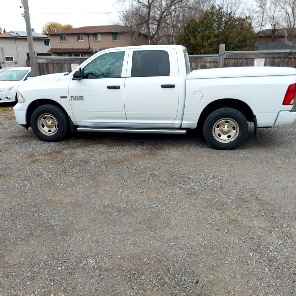 Used 2015 RAM 1500 4WD Crew Cab 140.5