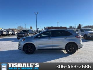 <b>Sunroof, Heated Seats, Equipment 250A Group, Cold Weather Package!</b><br> <br> <br> <br>Check out the large selection of new Fords at Tisdales today!<br> <br>  With a great mix of efficiency and incredible performance, the Ford Edge is here to get you wherever you want to go. <br> <br>With meticulous attention to detail and amazing style, the Ford Edge seamlessly integrates power, performance and handling with awesome technology to help you multitask your way through the challenges that life throws your way. Made for an active lifestyle and spontaneous getaways, the Ford Edge is as rough and tumble as you are. Push the boundaries and stay connected to the road with this sweet ride!<br> <br> This iconic silver metallic SUV  has an automatic transmission and is powered by a  250HP 2.0L 4 Cylinder Engine.<br> <br> Our Edges trim level is ST Line. Taking things to the edge with this ST Line trim, featuring unique gloss-black wheels, a blacked-out grille with trim-specific exterior styling, aggressive exhaust tips, front fog lamps, a numeric keypad for extra security, and supportive ActiveX heated front bucket seats, with power-adjustment and lumbar support. This trim also features a power liftgate for rear cargo access, a key fob with remote engine start and rear parking sensors, a 12-inch capacitive infotainment screen bundled with wireless Apple CarPlay and Android Auto, SiriusXM satellite radio, a 6-speaker audio setup, and 4G mobile hotspot internet connectivity. You and yours are assured of optimum road safety, with blind spot detection, rear cross traffic alert, pre-collision assist with automatic emergency braking, lane keeping assist, lane departure warning, forward collision alert, driver monitoring alert, and a rearview camera with an inbuilt washer. Also standard include proximity keyless entry, dual-zone climate control, 60-40 split front folding rear seats, LED headlights with automatic high beams, and even more. This vehicle has been upgraded with the following features: Sunroof, Heated Seats, Equipment 250a Group, Cold Weather Package. <br><br> View the original window sticker for this vehicle with this url <b><a href=http://www.windowsticker.forddirect.com/windowsticker.pdf?vin=2FMPK4J97RBA59647 target=_blank>http://www.windowsticker.forddirect.com/windowsticker.pdf?vin=2FMPK4J97RBA59647</a></b>.<br> <br>To apply right now for financing use this link : <a href=http://www.tisdales.com/shopping-tools/apply-for-credit.html target=_blank>http://www.tisdales.com/shopping-tools/apply-for-credit.html</a><br><br> <br/> Total  cash rebate of $3500 is reflected in the price. Credit includes $3,500 Delivery Allowance.  7.99% financing for 84 months. <br> Buy this vehicle now for the lowest bi-weekly payment of <b>$353.30</b> with $0 down for 84 months @ 7.99% APR O.A.C. ( Plus applicable taxes -  $699 administration fee included in sale price.   ).  Incentives expire 2024-06-25.  See dealer for details. <br> <br>Tisdales is not your standard dealership. Sales consultants are available to discuss what vehicle would best suit the customer and their lifestyle, and if a certain vehicle isnt readily available on the lot, one will be brought in.<br> Come by and check out our fleet of 20+ used cars and trucks and 70+ new cars and trucks for sale in Kindersley.  o~o