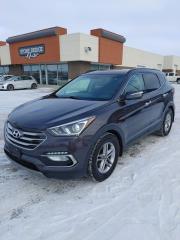 Come Finance this vehicle with us. Apply on our website stonebridgeauto.com <br>
2018 Hyundai Santa Fe Sport Premium with 124000kms. 2.4 liter 4 cylinder All wheel drive.

Clean title and safetied. No major collisions on record. Always owned in Manitoba 

Heated front seats 
Heated steering wheel 
Heated rear seats 
Dual climate control 
Cruise control 
Bluetooth 
Blind spot monitoring 

We take trades! Vehicle is for sale in Steinbach by STONE BRIDGE AUTO INC. Dealer #5000 we are a small business focused on customer satisfaction. Financing is available if needed. Text or call before coming to view and ask for sales. 