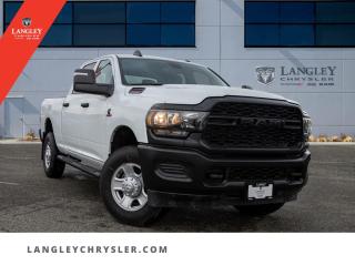 <p><strong><span style=font-family:Arial; font-size:16px;>Become part of the evolution of driving with this unmatched vehicle..</span></strong></p> <p><strong><span style=font-family:Arial; font-size:16px;>Introducing the 2024 RAM 3500 Tradesman, fresh off the production line and ready to make a lasting impression..</span></strong> <br> This brand new pickup truck, finished in a majestic white exterior and a sophisticated grey interior, is a testament to RAMs commitment to quality, durability, and unmatched strength.. This isnt just a vehicle; its a symbol of power and precision.</p> <p><strong><span style=font-family:Arial; font-size:16px;>The 6.7L 6-cylinder engine purrs like a well-fed lion, ready to take on any challenge you throw its way..</span></strong> <br> The 6-speed automatic transmission ensures that you always have the power and smoothness you need, regardless of the terrain or traffic conditions.. The RAM 3500 Tradesman is not just about brawn, its equally focused on comfort and convenience.</p> <p><strong><span style=font-family:Arial; font-size:16px;>The feature-packed cabin includes air conditioning, power windows, and power steering, ensuring every journey is a comfortable one..</span></strong> <br> The crew cab layout provides ample space for your crew and their gear, making this the perfect vehicle for work or play.. Safety is paramount in the RAM 3500. Equipped with ABS brakes, electronic stability, and an array of airbags, this vehicle is built to protect.</p> <p><strong><span style=font-family:Arial; font-size:16px;>Whats more? The traction control ensures you maintain grip, and the tire pressure warning system keeps you informed..</span></strong> <br> But wait, theres more! This vehicle is not just about practicality; its about having fun too.. The AM/FM radio will keep you entertained, while the delay-off headlights add a touch of convenience to your evening drives.</p> <p><strong><span style=font-family:Arial; font-size:16px;>And lets not forget the front beverage holders; because who doesnt enjoy a hot cup of coffee on a long drive?

At Langley Chrysler, we believe that buying a car should be as enjoyable as driving it..</span></strong> <br> Thats why were here to make the process as easy and enjoyable as possible.. We dont just want you to love your new RAM 3500 Tradesman; we want you to love buying it!

So why wait? This brand new, never driven RAM 3500 Tradesman is ready to be yours.</p> <p><strong><span style=font-family:Arial; font-size:16px;>Come down to Langley Chrysler today and let us help you become part of the evolution of driving..</span></strong> <br> Oh, and did we mention that the RAM 3500 is the only pickup truck that can double as a mobile concert stage? Well, it cant.. But with the Tradesmans fantastic audio system, it sure will feel like it!</p>Documentation Fee $968, Finance Placement $628, Safety & Convenience Warranty $699

<p>*All prices are net of all manufacturer incentives and/or rebates and are subject to change by the manufacturer without notice. All prices plus applicable taxes, applicable environmental recovery charges, documentation of $599 and full tank of fuel surcharge of $76 if a full tank is chosen.<br />Other items available that are not included in the above price:<br />Tire & Rim Protection and Key fob insurance starting from $599<br />Service contracts (extended warranties) for up to 7 years and 200,000 kms starting from $599<br />Custom vehicle accessory packages, mudflaps and deflectors, tire and rim packages, lift kits, exhaust kits and tonneau covers, canopies and much more that can be added to your payment at time of purchase<br />Undercoating, rust modules, and full protection packages starting from $199<br />Flexible life, disability and critical illness insurances to protect portions of or the entire length of vehicle loan?im?im<br />Financing Fee of $500 when applicable<br />Prices shown are determined using the largest available rebates and incentives and may not qualify for special APR finance offers. See dealer for details. This is a limited time offer.</p>