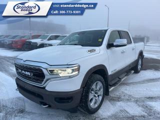 <b>Navigation,  Wireless Charging,  Leather Seats,  Cooled Seats,  Heated Rear Seats!</b><br> <br>  Compare at $37884 - Our Price is just $29900! <br> <br>   Beauty meets brawn with this rugged Ram 1500. This  2019 Ram 1500 is for sale today in Swift Current. <br> <br>The Ram 1500 delivers power and performance everywhere you need it, with a tech-forward cabin that is all about comfort and convenience. Loaded with best-in-class features, its easy to see why the Ram 1500 is so popular. With the most towing and hauling capability in a Ram 1500, as well as improved efficiency and exceptional capability, this truck has the grit to take on any task. This  Crew Cab 4X4 pickup  has 182,250 kms. Its  ivory tri-coat pearl in colour  . It has a 8 speed automatic transmission and is powered by a  395HP 5.7L 8 Cylinder Engine.  <br> <br> Our 1500s trim level is Limited. This top of the line Ram 1500 Limited comes very well equipped with exclusive aluminum wheels and elegant styling, heated and cooled premium leather seats with heated second row seats, blind spot detection and Uconnect 4C with a larger touchscreen that features a premium Alpine stereo system and built-in navigation. This stunning truck also comes with unique chrome accents, a heated leather steering wheel, dual zone climate control, wireless charging, Active-Level air suspension, bi-functional LED headlights, front and rear Park-Sense sensors, power heated side mirrors, proximity keyless entry, a spray in bed liner, LED cargo area lights, power seats w/ memory, towing equipment, front fog lights, power adjustable pedals and so much more. This vehicle has been upgraded with the following features: Navigation,  Wireless Charging,  Leather Seats,  Cooled Seats,  Heated Rear Seats,  Remote Start,  Heated Steering Wheel. <br> To view the original window sticker for this vehicle view this <a href=http://www.chrysler.com/hostd/windowsticker/getWindowStickerPdf.do?vin=1C6SRFHT6KN689362 target=_blank>http://www.chrysler.com/hostd/windowsticker/getWindowStickerPdf.do?vin=1C6SRFHT6KN689362</a>. <br/><br> <br>To apply right now for financing use this link : <a href=https://standarddodge.ca/financing target=_blank>https://standarddodge.ca/financing</a><br><br> <br/><br>* Stop By Today *Test drive this must-see, must-drive, must-own beauty today at Standard Chrysler Dodge Jeep Ram, 208 Cheadle St W., Swift Current, SK S9H0B5! <br><br> Come by and check out our fleet of 30+ used cars and trucks and 120+ new cars and trucks for sale in Swift Current.  o~o